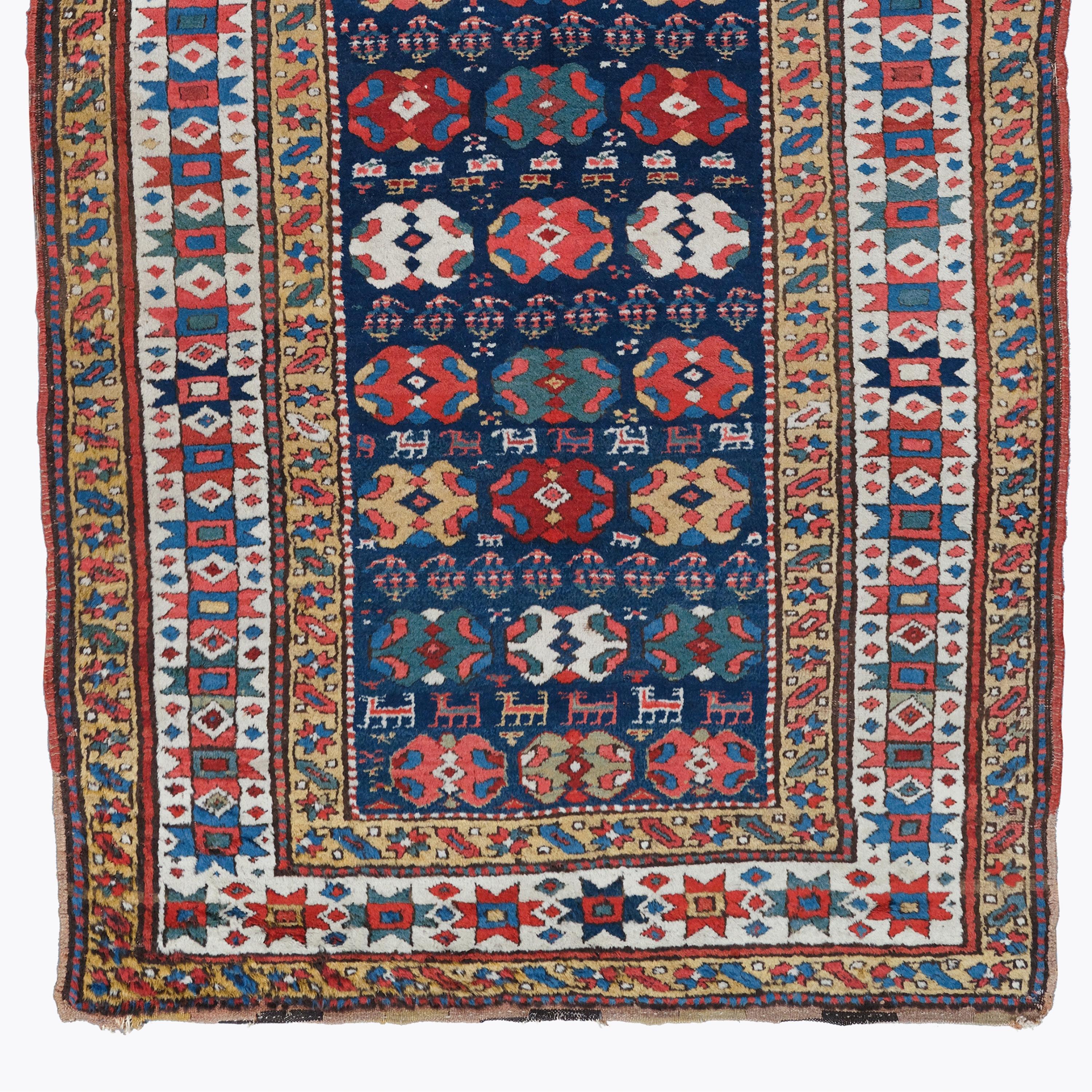 Antique Shahsevan Long Rug
19th Century Caucasian Shahsevan Long Rug
Size: 118×280 cm  3,87x9,18 Ft

This 19th century Caucasian Shahsevan carpet adds nobility to any space with its historical texture and rich color palette. Its geometric patterns
