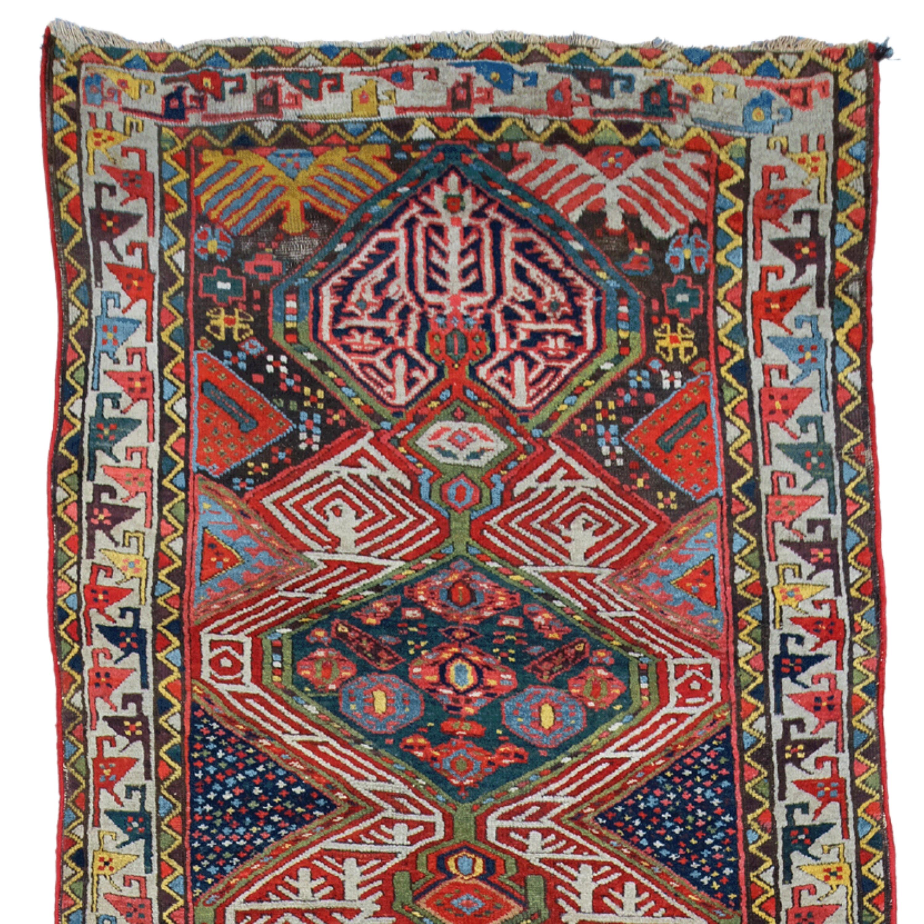 This exquisite antique Shahsevan runner is a masterpiece that showcases the artistic richness and mastery of craftsmanship of the 19th century. This work, carefully woven with wool material, reflects the cultural diversity of its period. This
