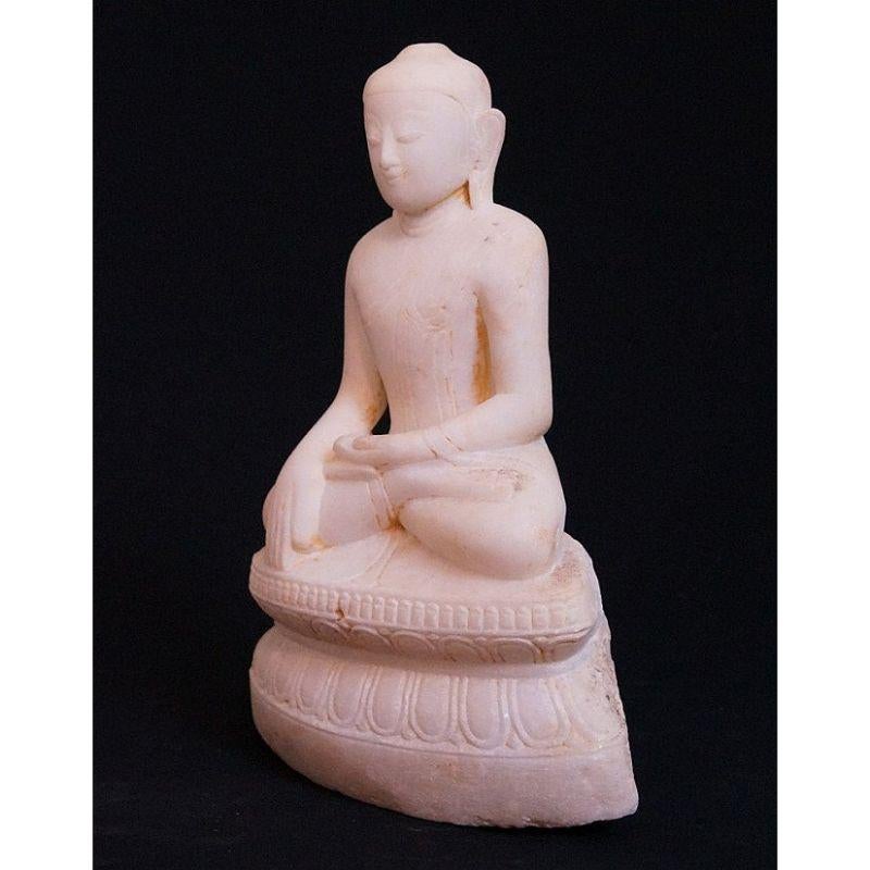 Material: marble
38 cm high 
Weight: 11 kgs
Shan (Tai Yai) style
Bhumisparsha mudra
Originating from Burma
18th century

