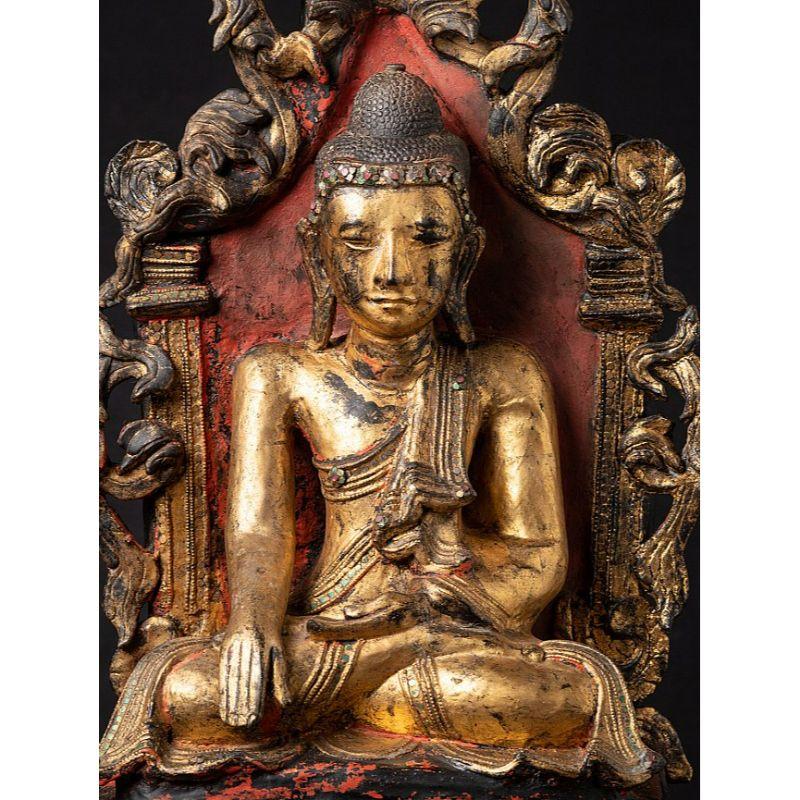 Material: lacquerware
85,5 cm high 
38 cm wide and 29,5 cm deep
Weight: 4.1 kgs
Gilded with 24 krt. gold
Shan (Tai Yai) style
Bhumisparsha mudra
Originating from Burma
19th century
Very exceptional & high quality !
