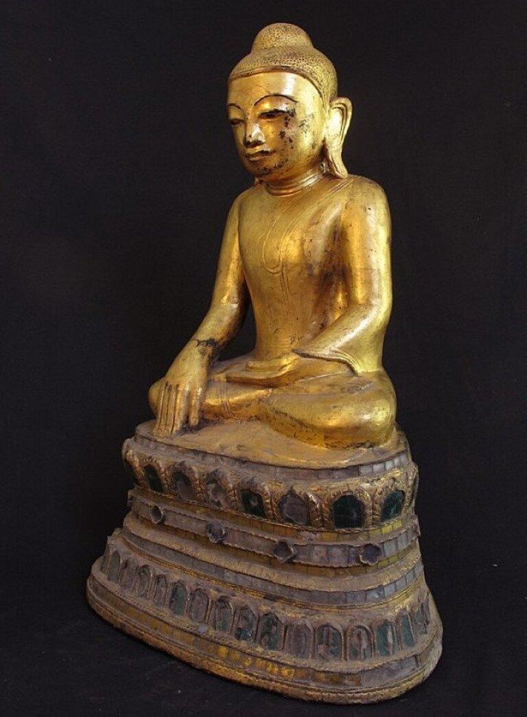 Material: lacquerware
56 cm high 
Weight: 2.95 kgs
Shan (Tai Yai) style
Bhumisparsha mudra
Originating from Burma
Early 19th century
Goldplated.
 