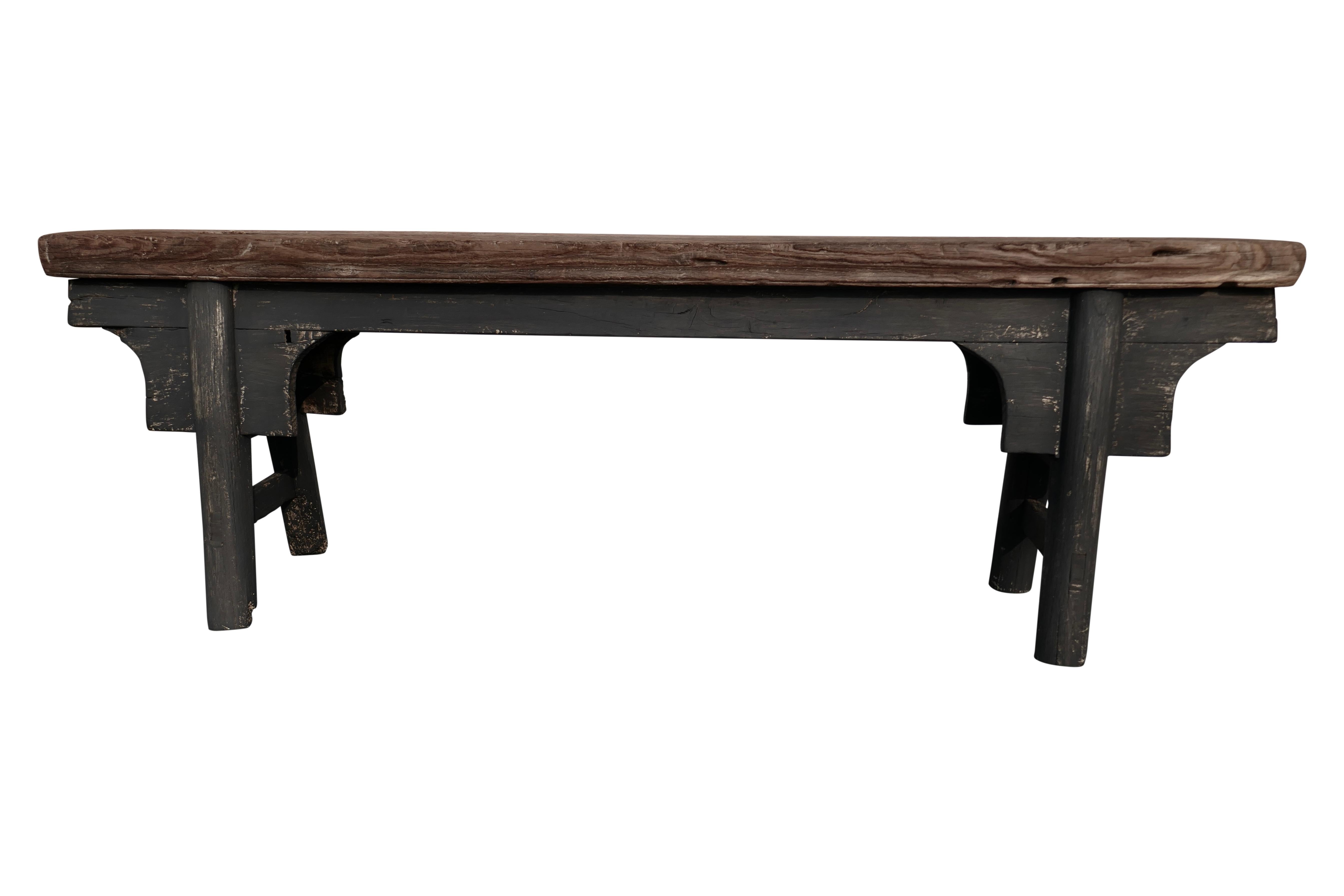 From our collection, a one-of-a-kind authentic antique Asian Shandong bench. This special unique piece was hand-created fro solid heavy elmwood, constructed together by early mortise & tenon joinery. The extra thick carved top show's amazing natural