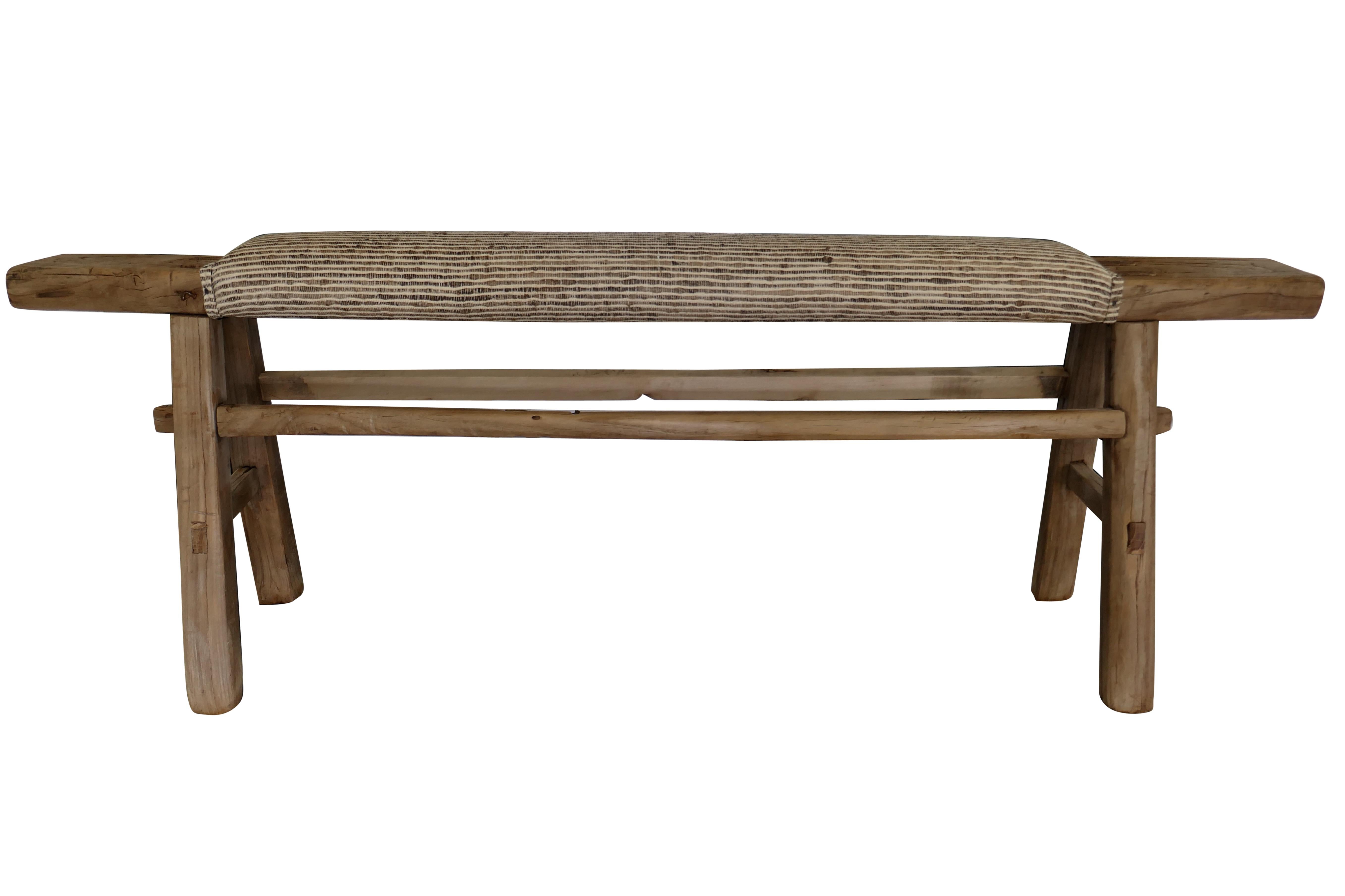 One-of-a-Kind!
Authentic antique (circa late 1800's) Asian Shandong bench hand-built from solid elmwood. Primitively constructed with mortise & tenon joinery. The natural raw elmwood shows beautiful rustic age character throughout that only time