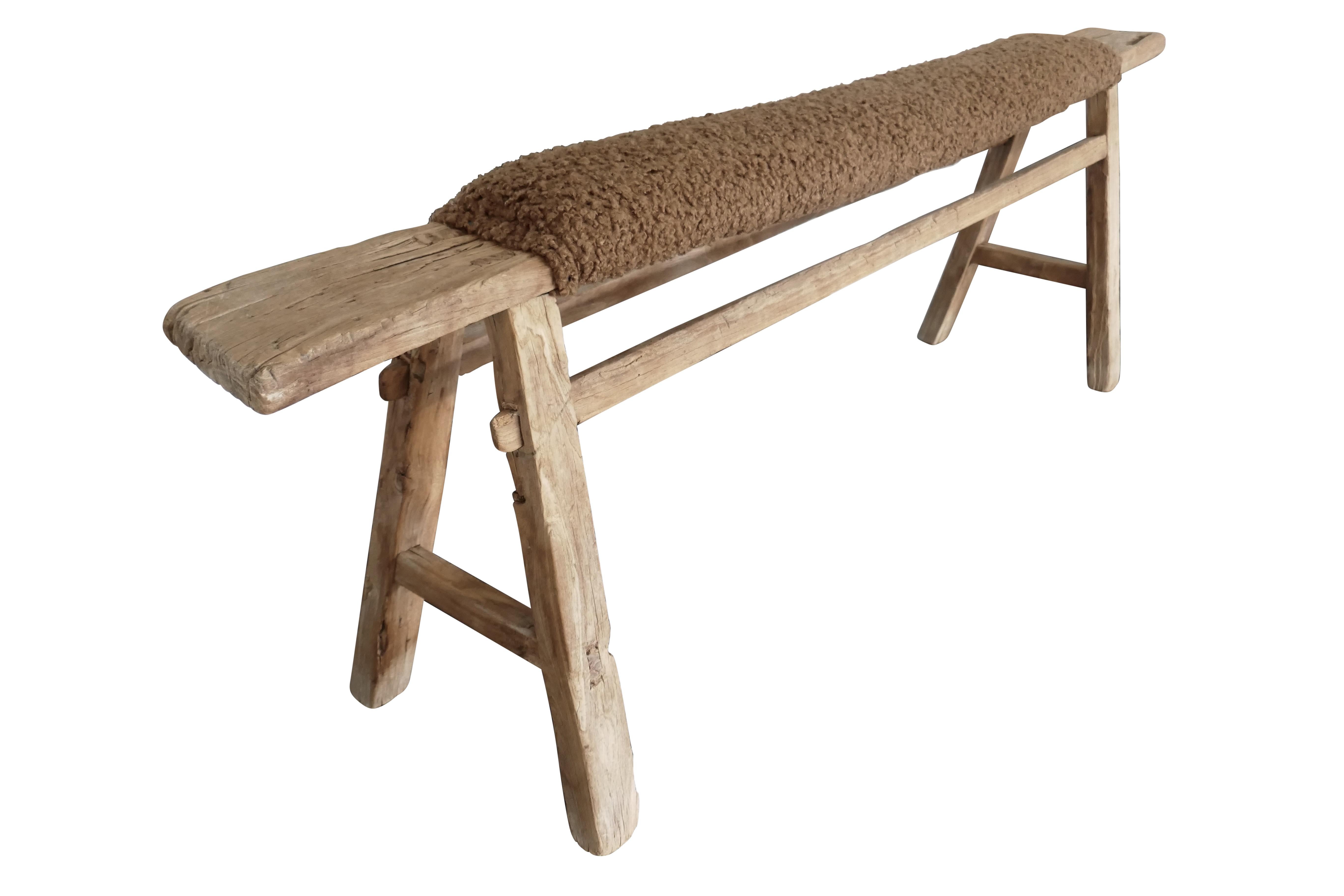 One-of-a-Kind!
Authentic vintage (circa late 1890's) Asian Shandong bench, hand-built from solid elmwood. Primitively constructed with mortise & tenon joinery. The natural raw elmwood shows beautiful rustic age character throughout that only time
