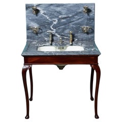 Lavabo antiguo de mármol Shanks and Co con soporte de caoba
