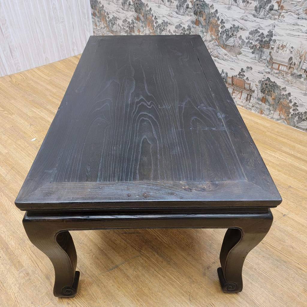 Antique Shanxi province black lacquer coffee table.

This antique Shanxi Province Black Coffee Table was made from a Chinese bed. The coffee table is made of elm and has been finished with black lacquer. 

Circa: 1900

H 18