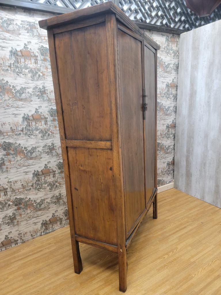 Antique Shanxi province cabinet with hand carving on lower apron.

This cabinet has 4 shelves, 2 drawers, and 2 doors. With original patina and hand carved design on lower apon.

Circa: 1900 

Dimensions:

W: 47.5