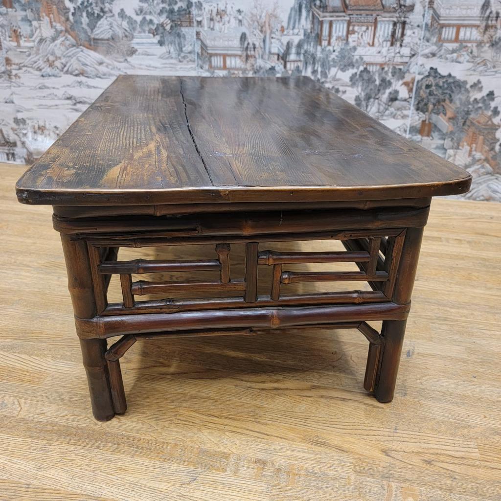 Antique Shanxi province elm and bamboo small tea table.

This antique elm and bamboo small tea table has its original color and patina. Can be used as a coffee table and is a great piece to brighten any room.

Circa: 1900

Dimensions:

W