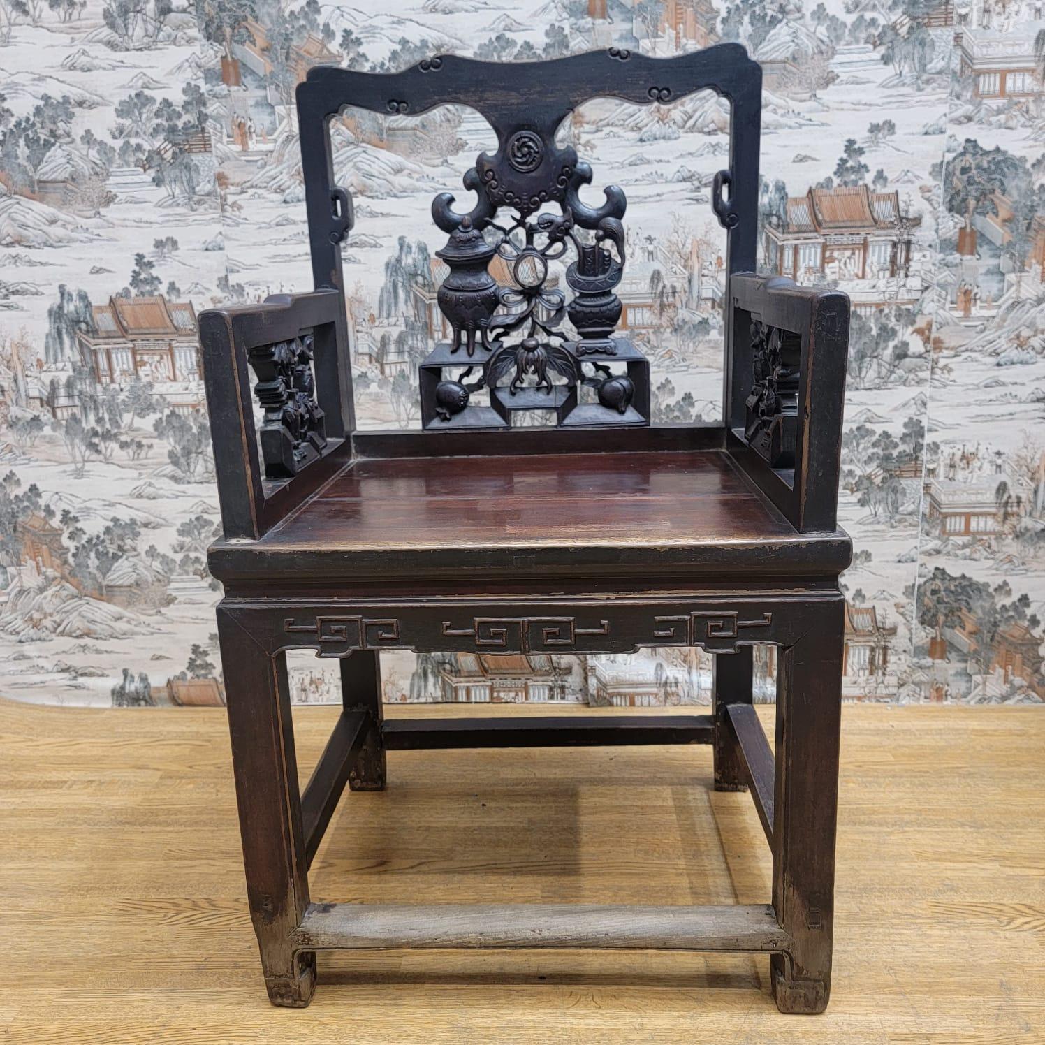 Antique Shanxi Province hand carved elm top hat official chair - pair

This pair of rare antique Shanxi Province top hat official chairs have all its original red color and patina. These chairs are hand carved and will be a statement in any room