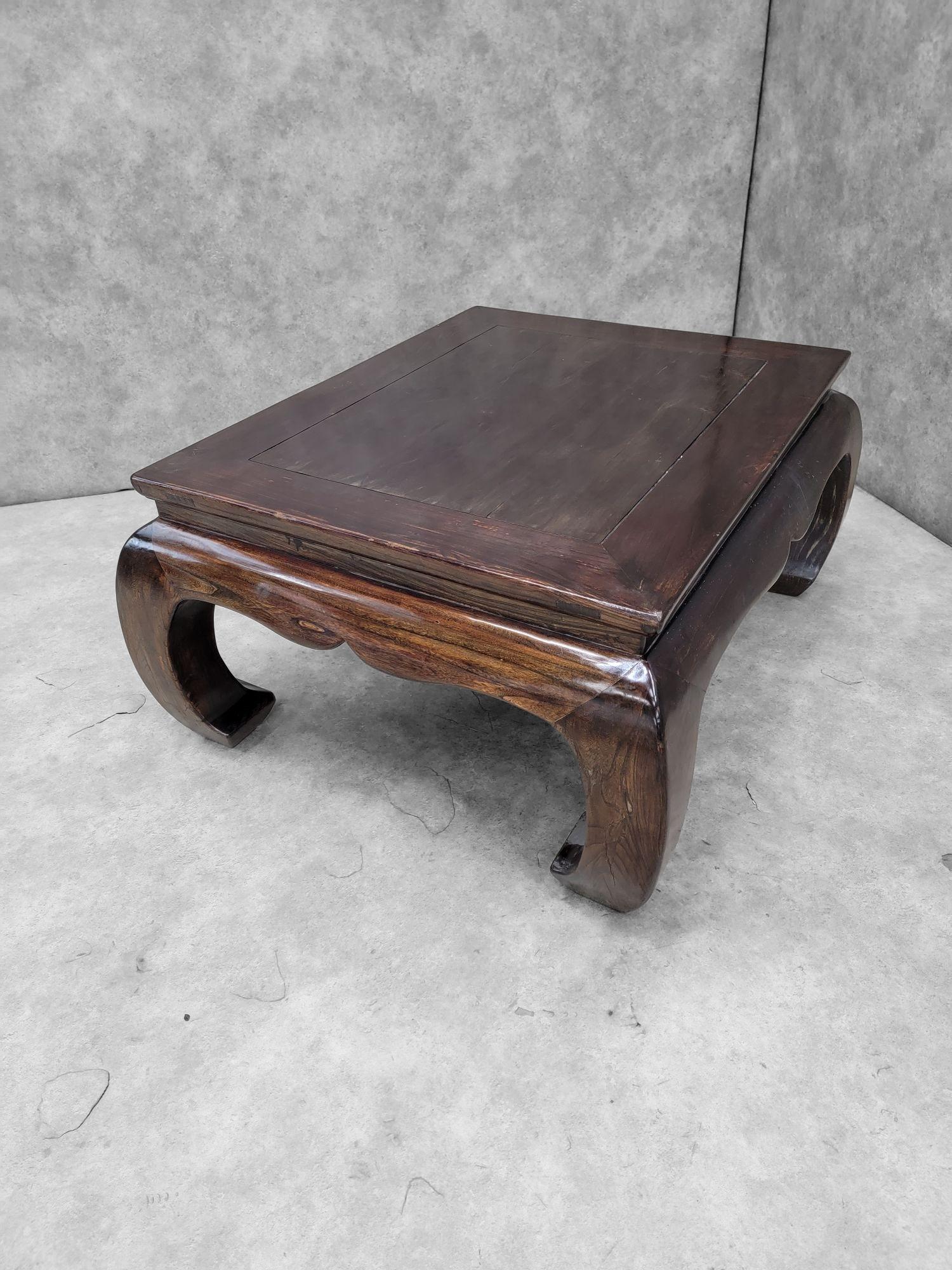Antique Shanxi Province Lacquer Elm Coffee Table

Elevate your living space with this exquisite antique Shanxi Province lacquer elm coffee table, a stunning piece that seamlessly blends history and elegance. The table legs have been carved to bow