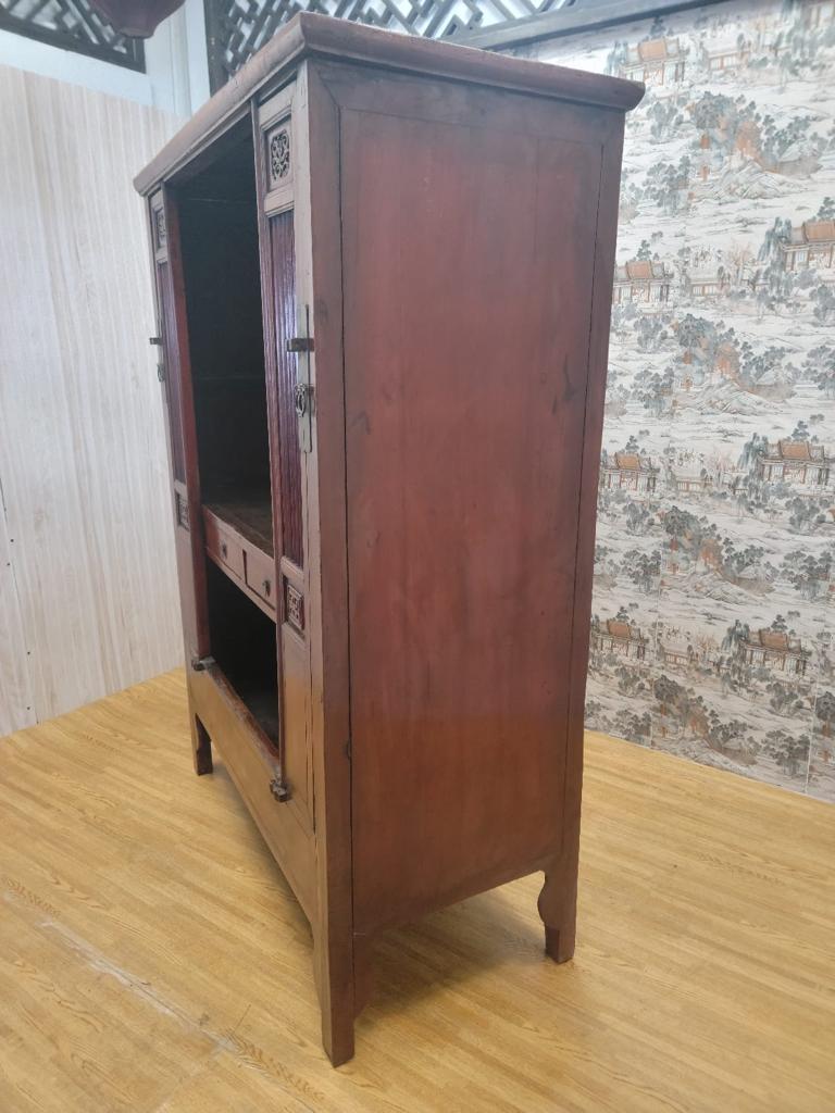 Antique Shanxi Province Red Elm Lacquered cabinet

This cabinet had 2 side doors, 2 shelves, and 2 drawers. Can be used as a bar, storage for fine china and crystal. A multifunctional piece of furniture to brighten up a room. This cabinet may have