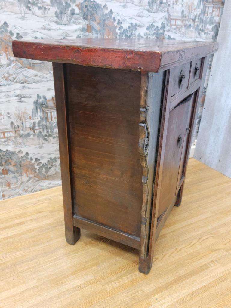 Early 20th Century Antique Shanxi Province Winged Red Lacquer Painted Small Cabinet For Sale
