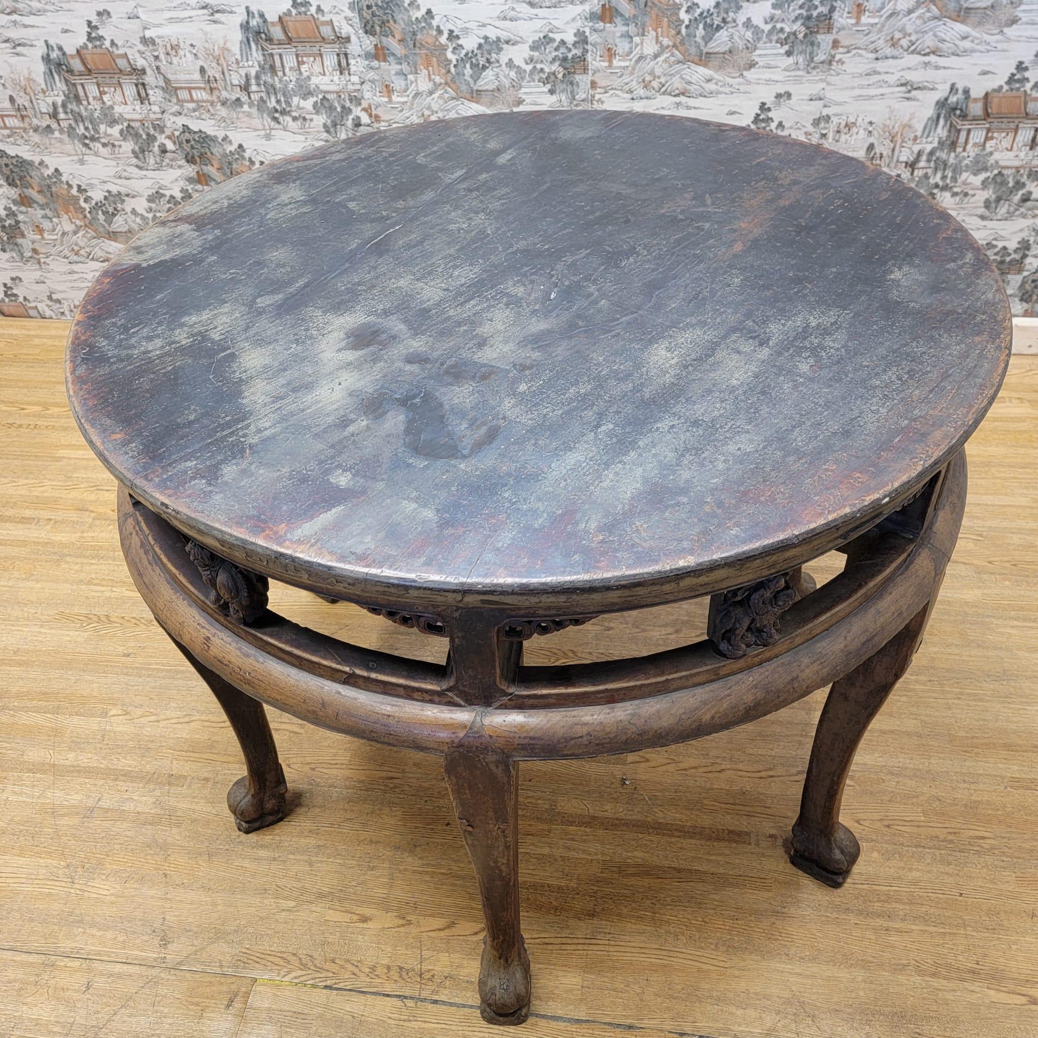 Early 20th Century Antique Shanxi Province Tall Elm Round Accent Table with Animal Carvings For Sale