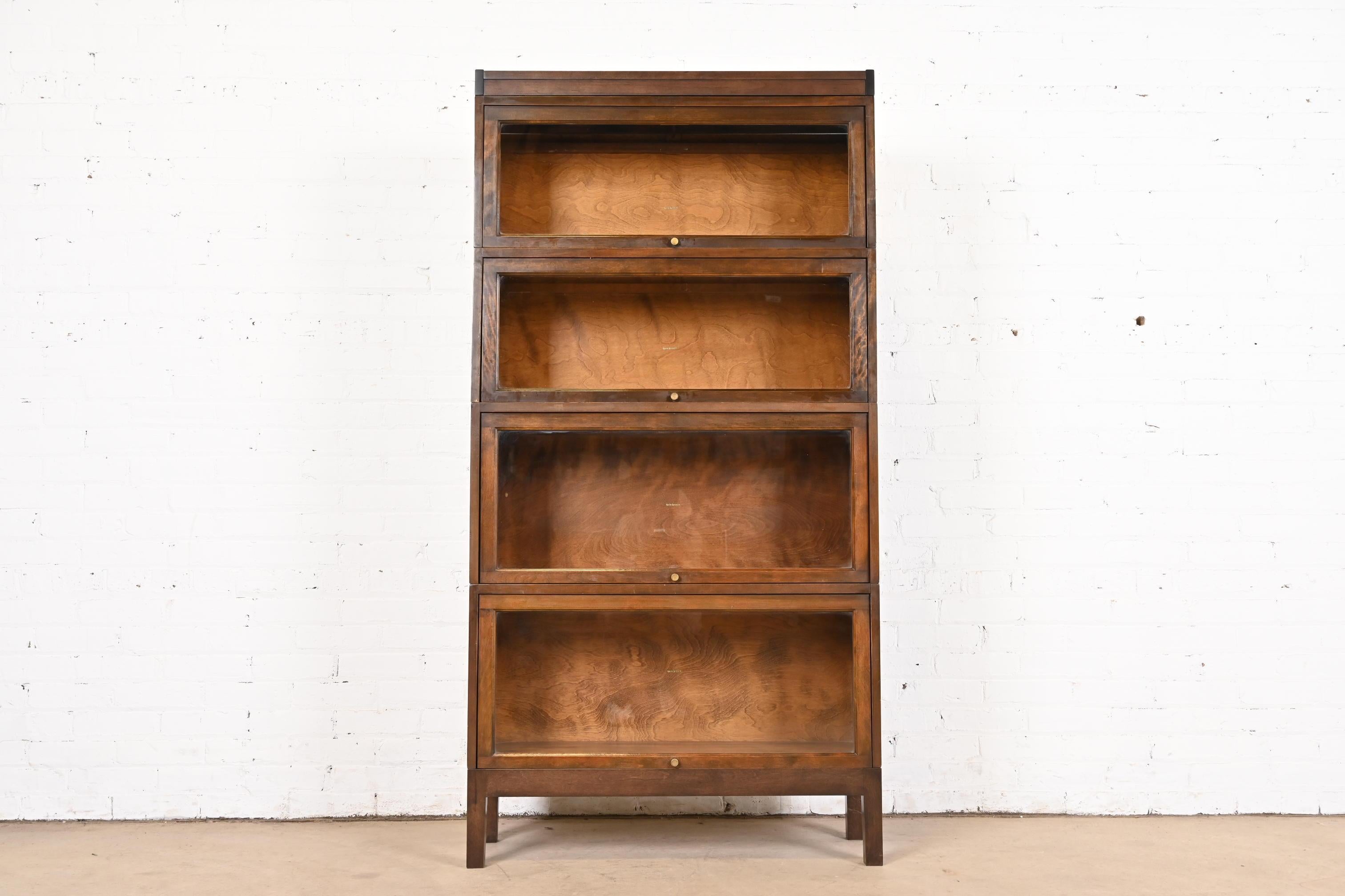 A gorgeous antique Arts & Crafts four-stack barrister bookcase

By Shaw Walker

USA, Circa 1920s

Mahogany, with glass front doors and brass hardware.

Measures: 34
