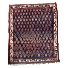 Antiquities Sheeraz Tribal Rug With Repeating Gul Motif - 5' X 4'1" (Tapis tribal antique de Sheeraz avec motif répétitif de Gul)