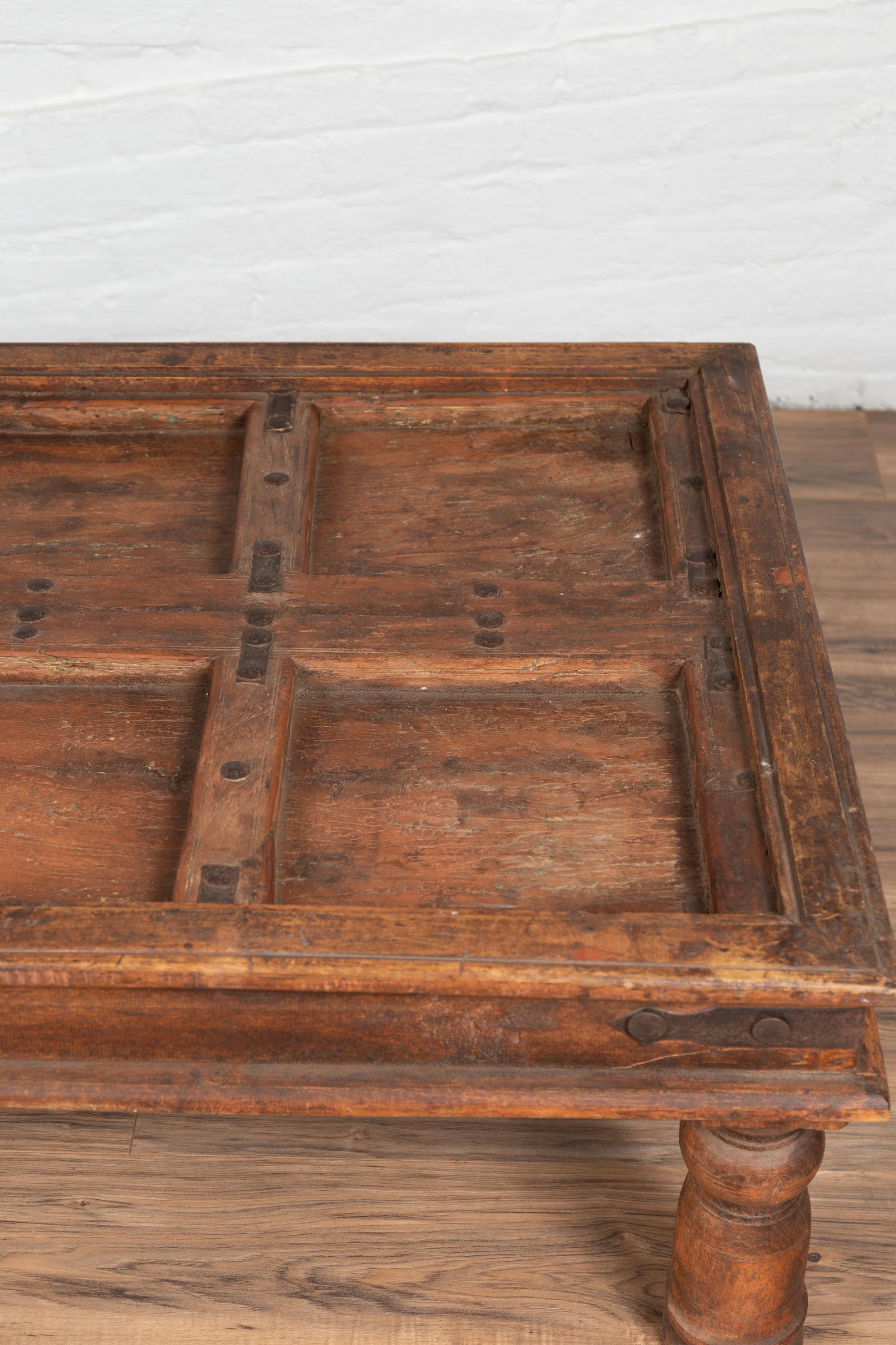 Antique Sheesham Wood Indian Palace Door Made into Coffee Table with Iron Studs In Good Condition In Yonkers, NY