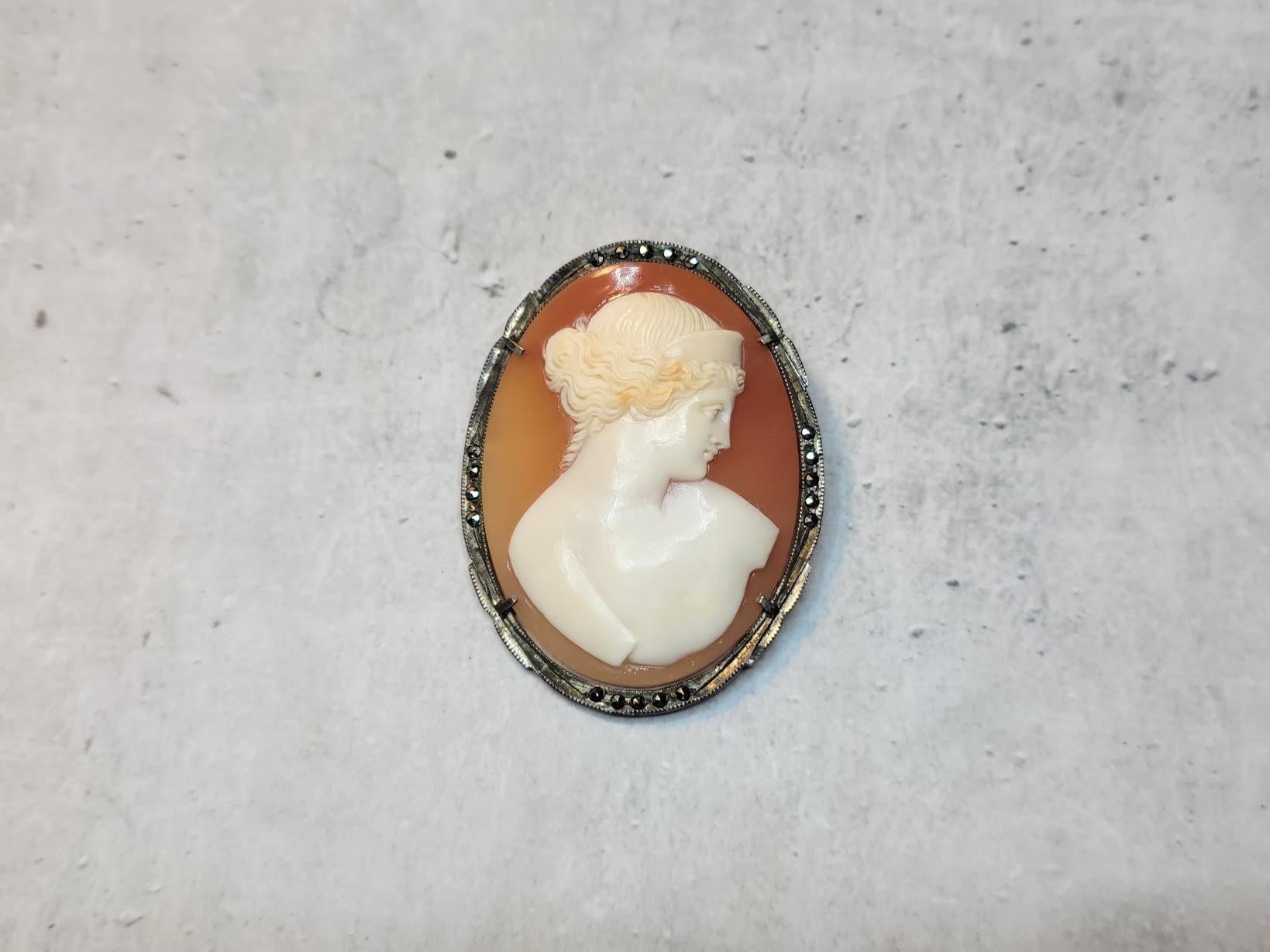 This fabulous carved Victorian brooch was made around the late 1800s. It depicts a beautiful portrait in the form of ancient Greek and Roman sculptures. The execution of the shell is amazing, and the relief helps to add details and dimension to the