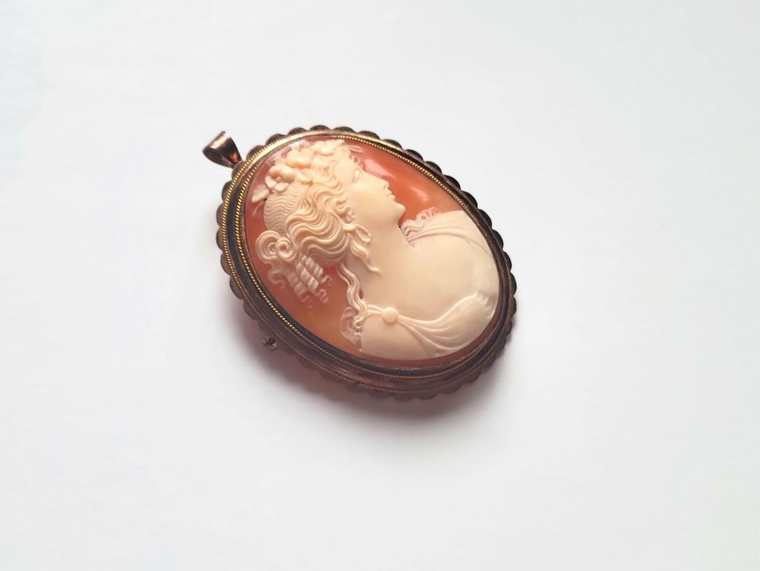 Lovely carved cameo brooch made in the late 19th - early 20th century. It depicts a beautiful portrait of a Flora (a Roman goddess of flowers and spring – a symbol for nature and flowers). The execution of the shell is amazing, and the relief helps