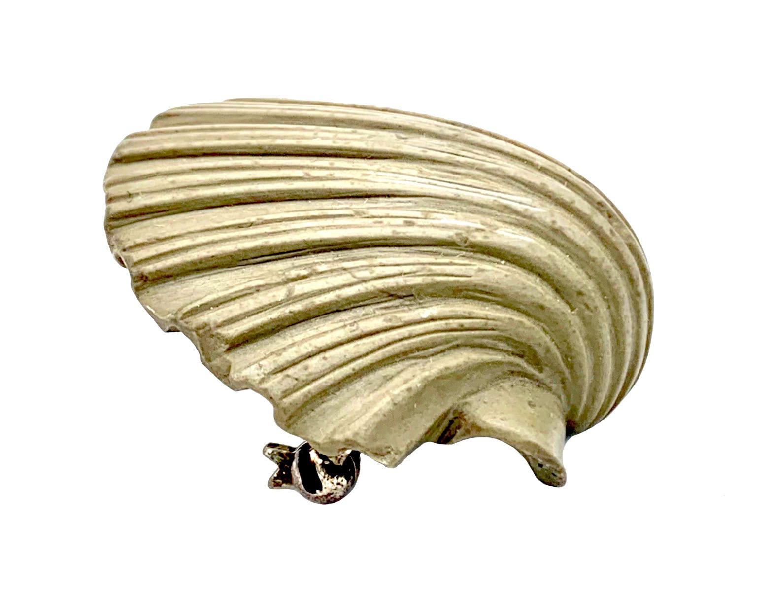 This lovely junky scallop shell has been hand carved out of lava in the first half of the nineteenth century. Scallops were the symbol of pilgrims that walked the camino de Santiago or the way of St, James,, they often had a scallop stitched onto