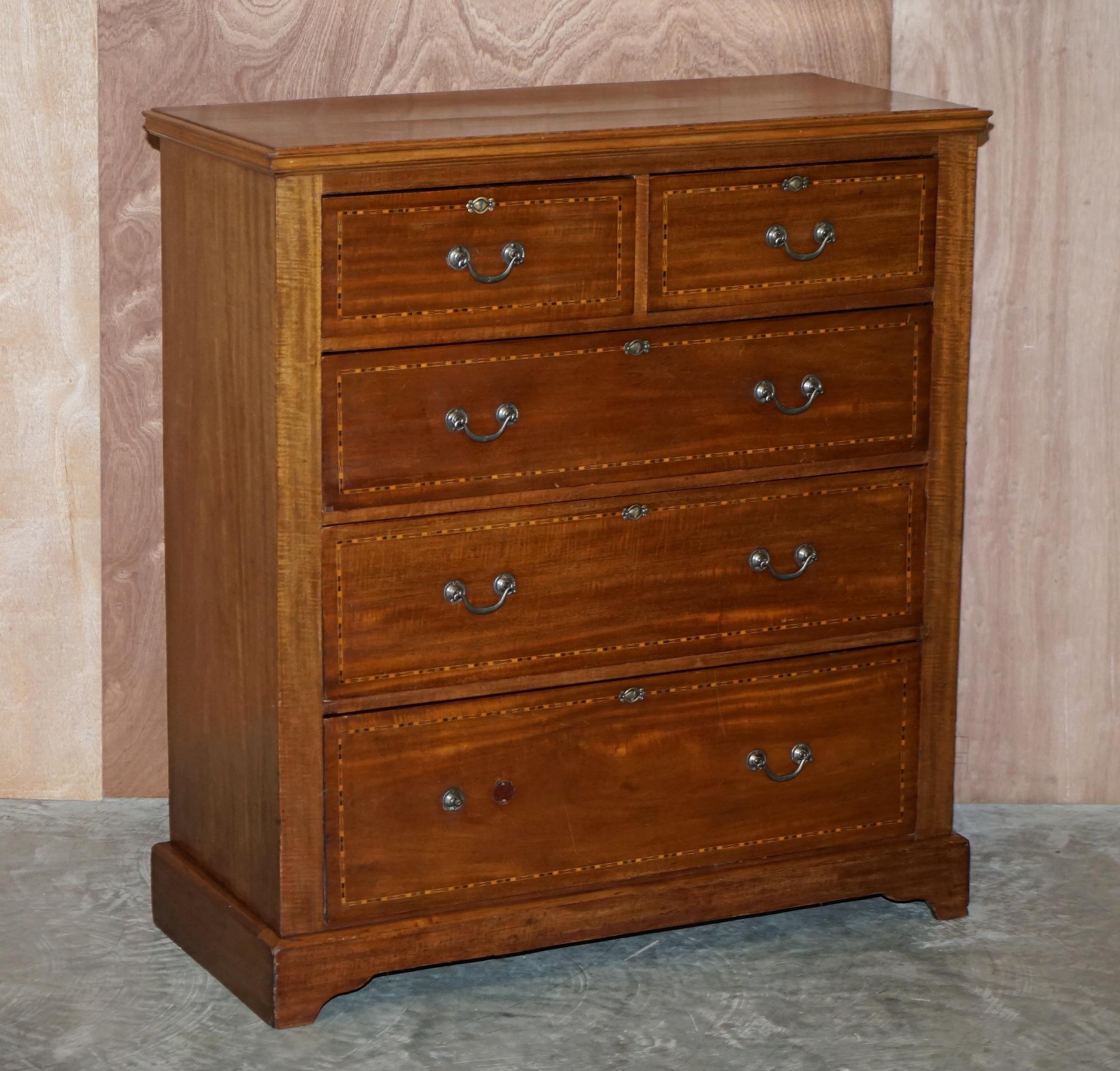 We are delighted to offer for sale this lovely Sheraton inlaid satinwood & mahogany chest of drawers

A very charming and finely made piece. Each drawer is beautifully inlaid in the Sheraton manner with boxwood. It is exquisite craftsmanship