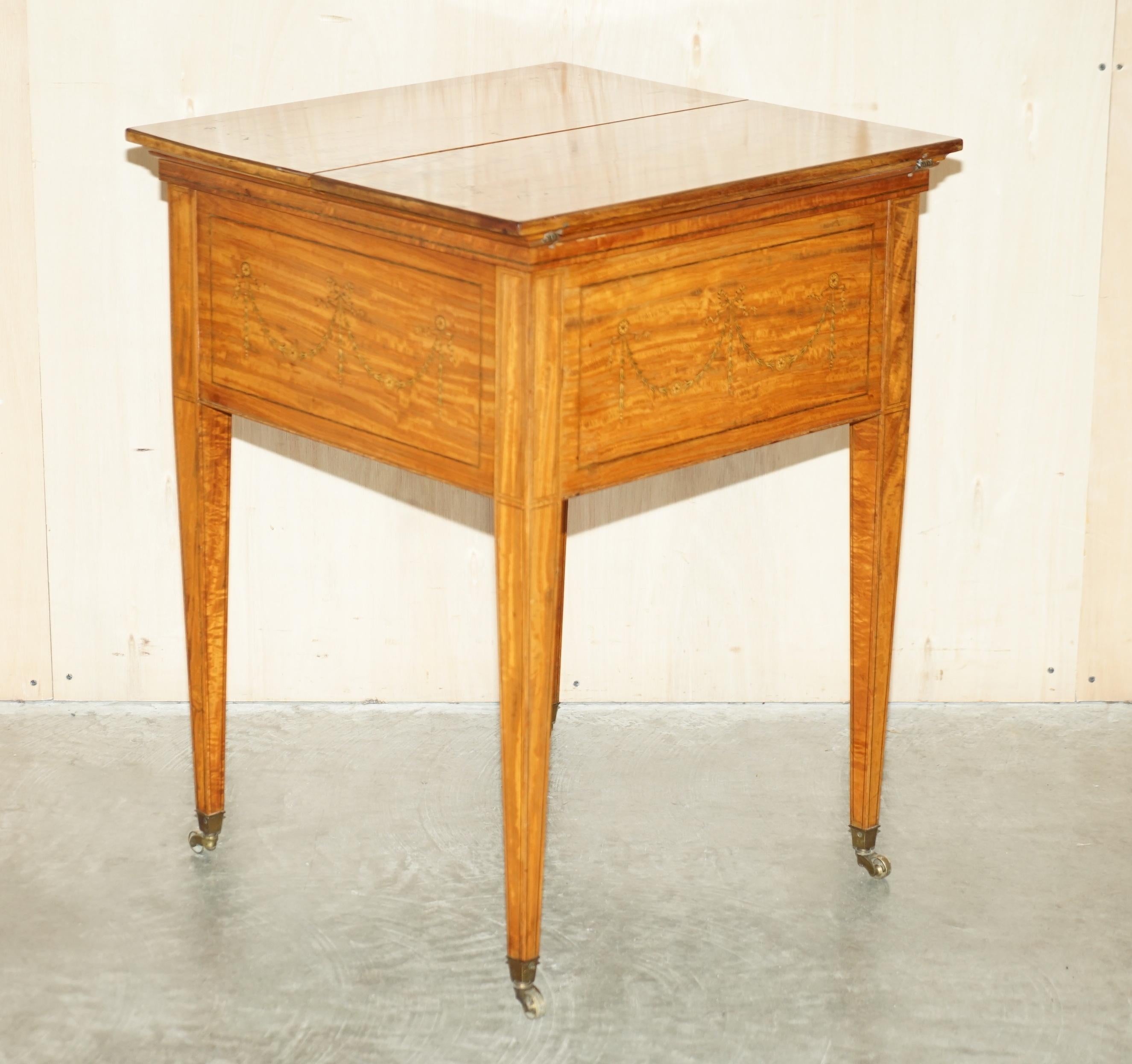 We are delighted to offer for sale this wonderful Victorian circa 1860-1880 Sheraton Revival Satinwood Elevette drinks table made and stamped by Maple & Co London

What a table! This really makes serving drinks a sense of occasion when it comes