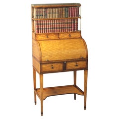 Antigua librería cilíndrica Sheraton de madera satinada