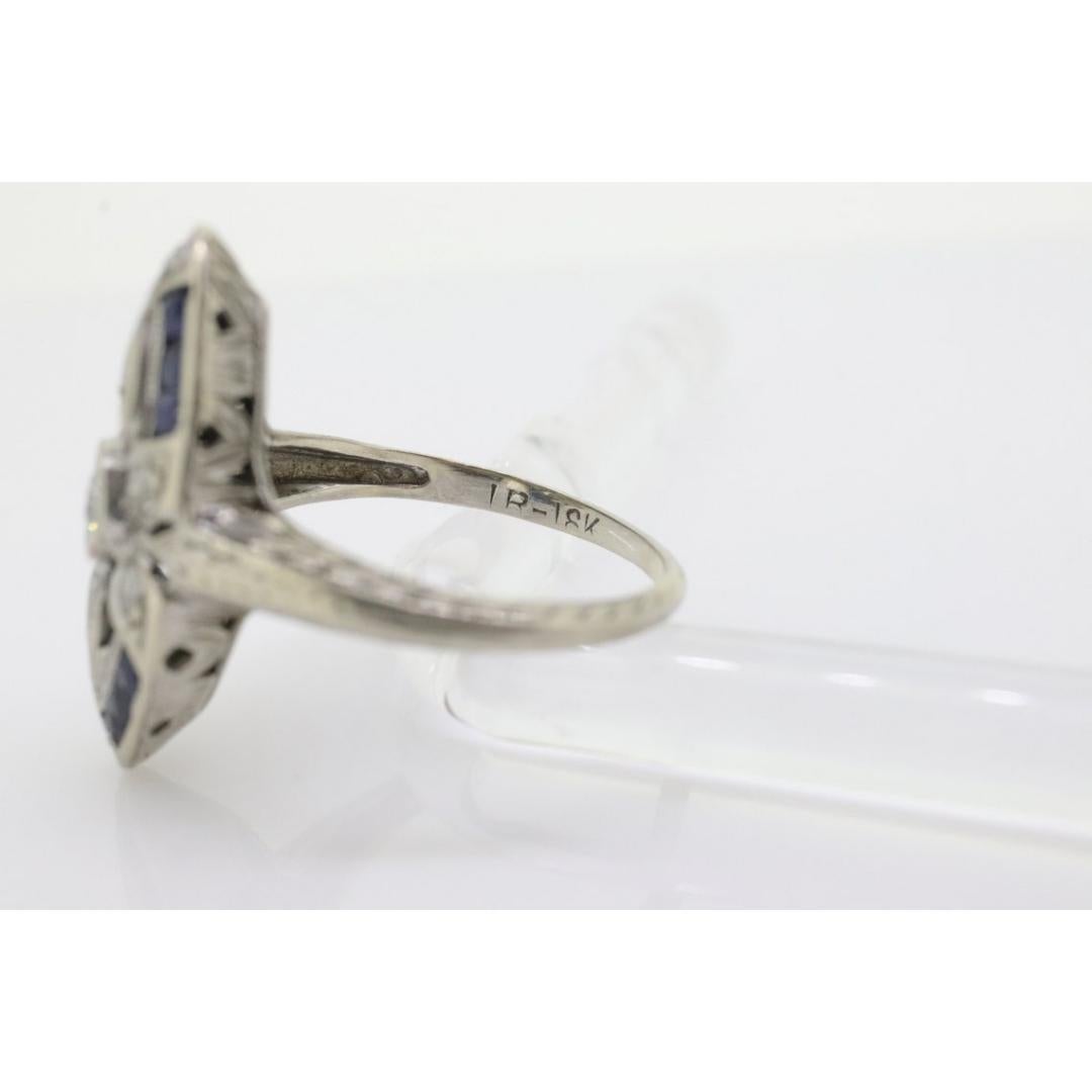 Antique Shield daisy ring. 18k diamond and sapphire shield ring. 18k Art Deco In Good Condition For Sale In Port Charlotte, FL