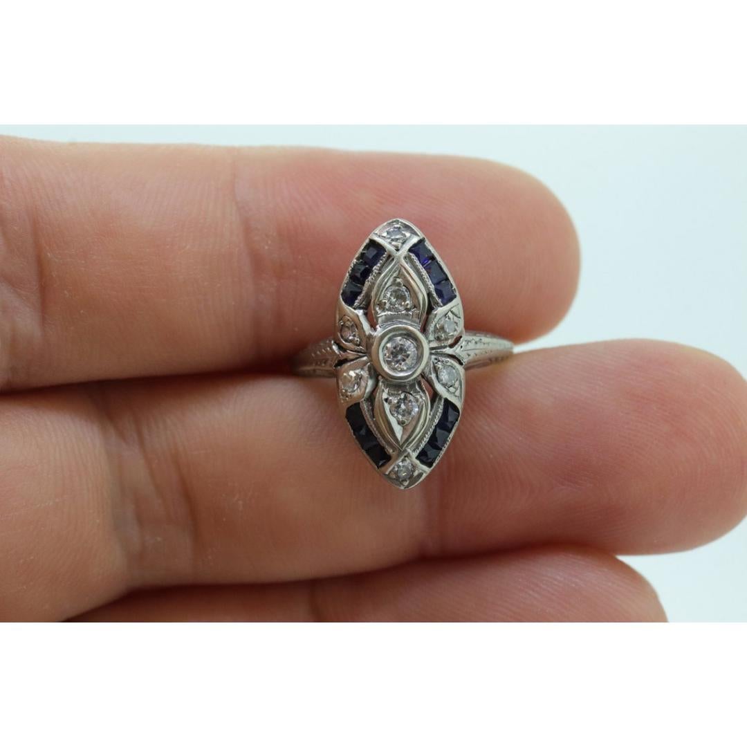 Antique Shield daisy ring. 18k diamond and sapphire shield ring. 18k Art Deco For Sale 1