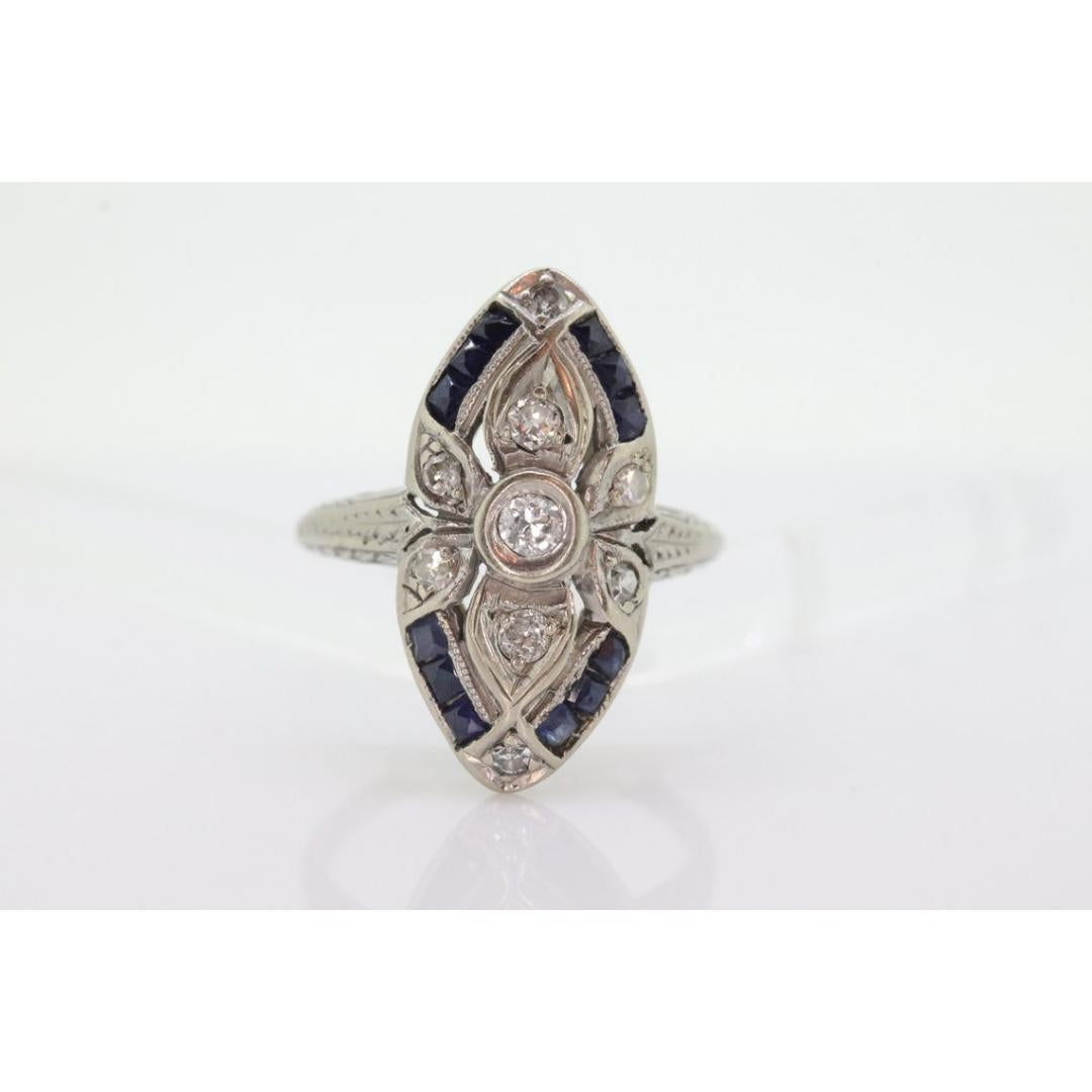 Antique Shield daisy ring. 18k diamond and sapphire shield ring. 18k Art Deco For Sale 2