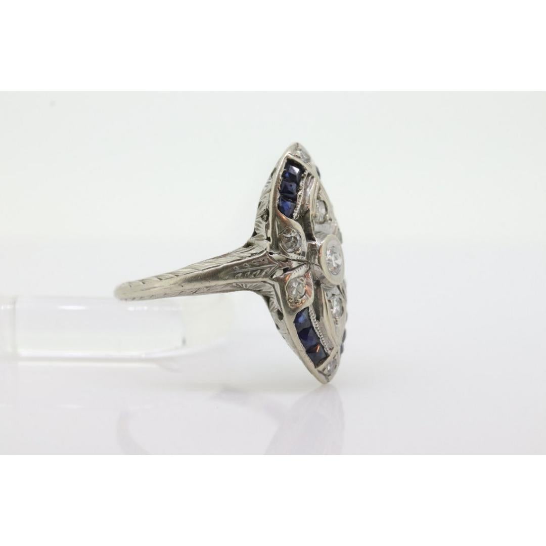 Antique Shield daisy ring. 18k diamond and sapphire shield ring. 18k Art Deco For Sale 4