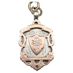 Antique shield fob pendant,  silver and 9k rose gold, Edwardian 