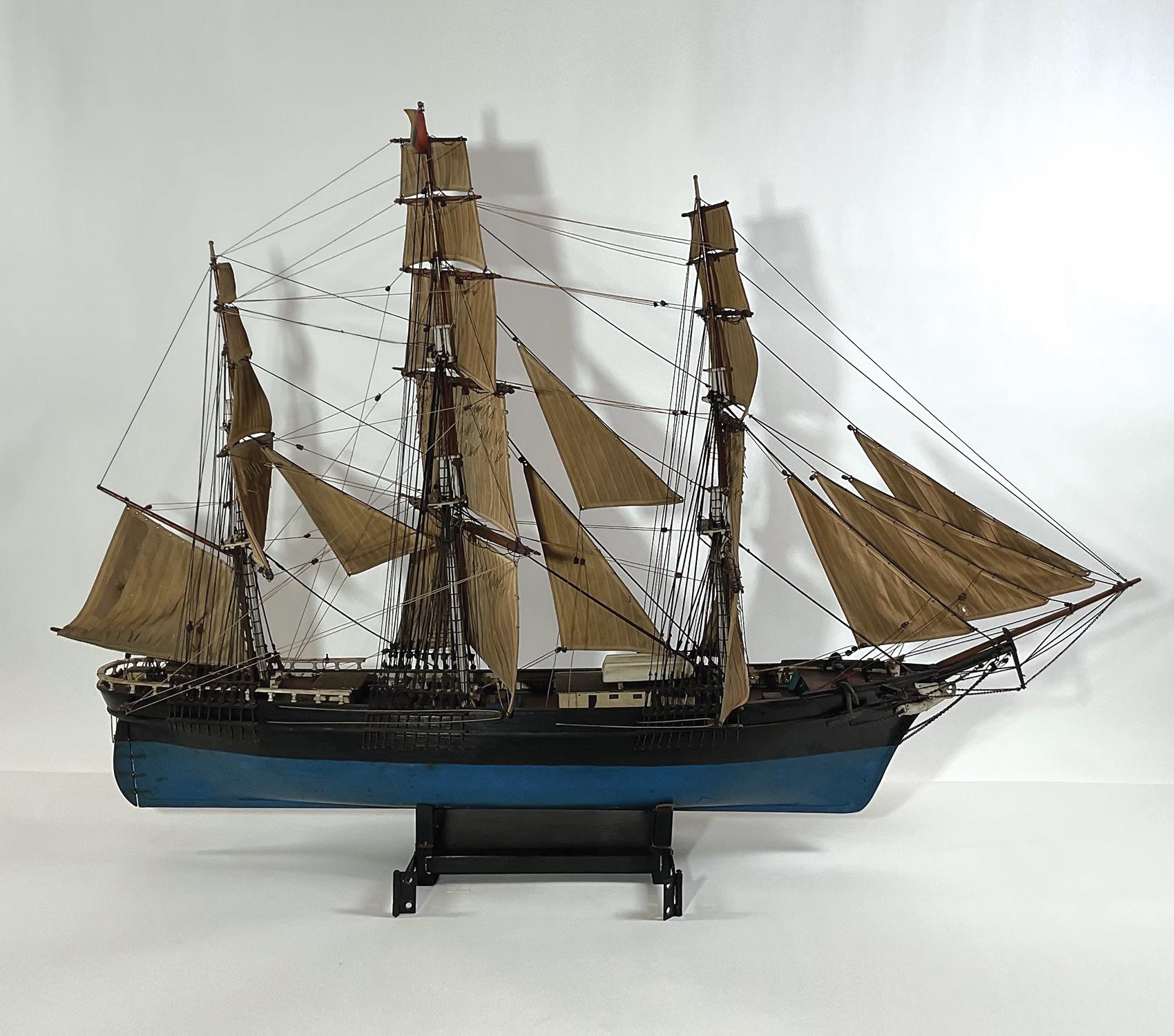 Antique early twentieth century model of the American clipper ship Flying Cloud by Thomas Rosenquist of Far Rockaway, New York. He has works in many museums. Famous builder from the past. With carved figurehead, anchors, capstans, etc.. Rigged with