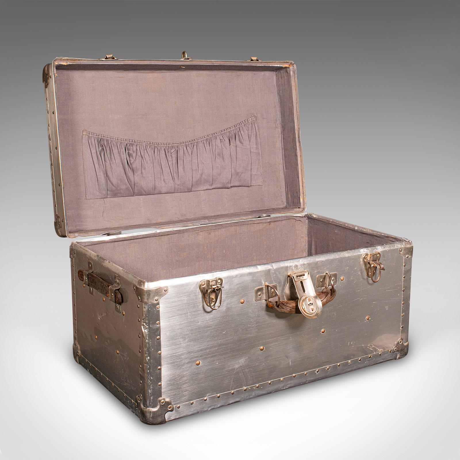 
This is an antique shipping trunk. A Continental, aluminium travelling chest, dating to the Edwardian period, circa 1910.

Appealing tonality and of a generous size
Could be used as a distinctive coffee table, or at the bedside 
Displays a