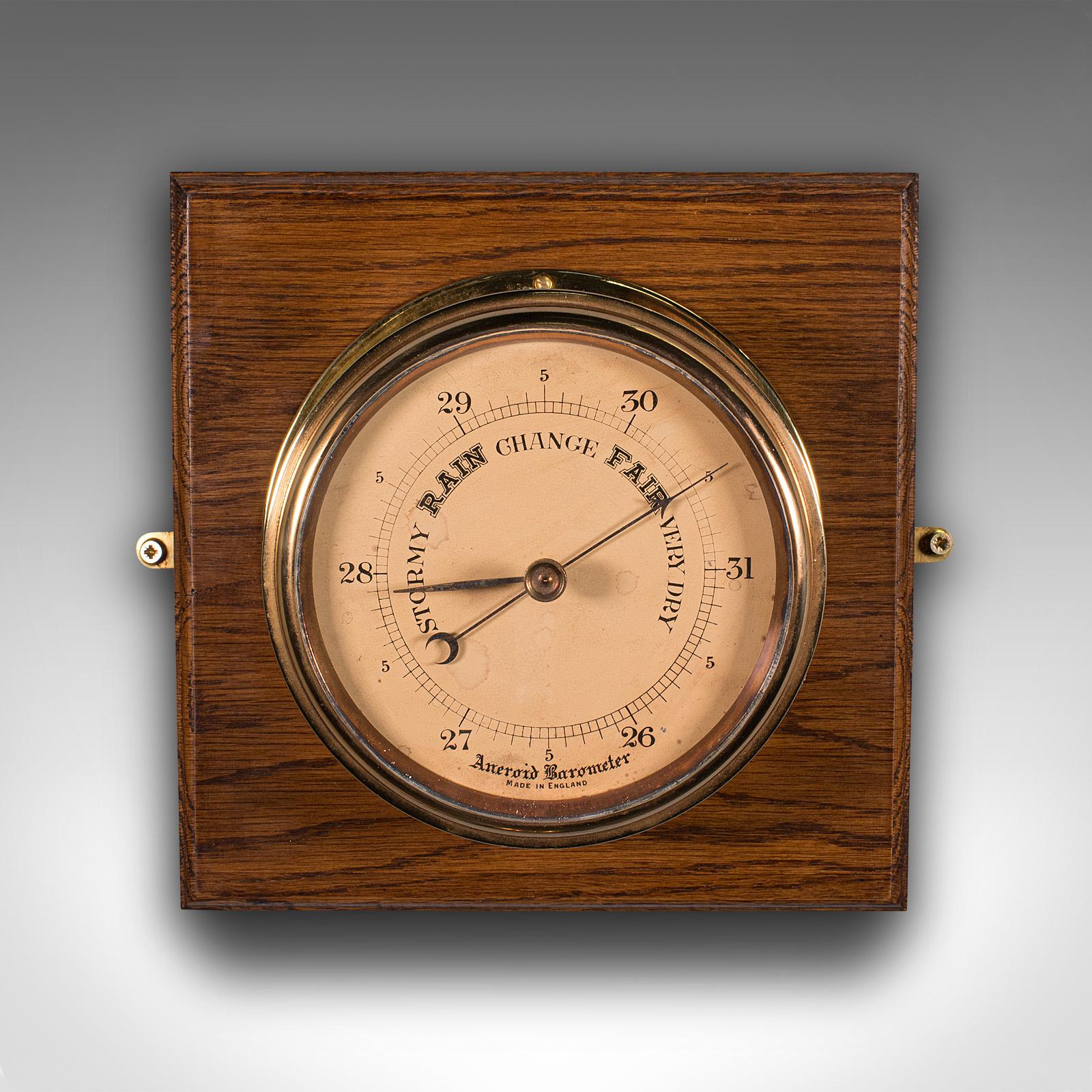 This is an antique ship's bulkhead barometer. An English, brass and oak maritime weather instrument, dating to the Edwardian period, circa 1910.

Delightfully presented maritime barometer
Displays a desirable aged patina throughout
Polished