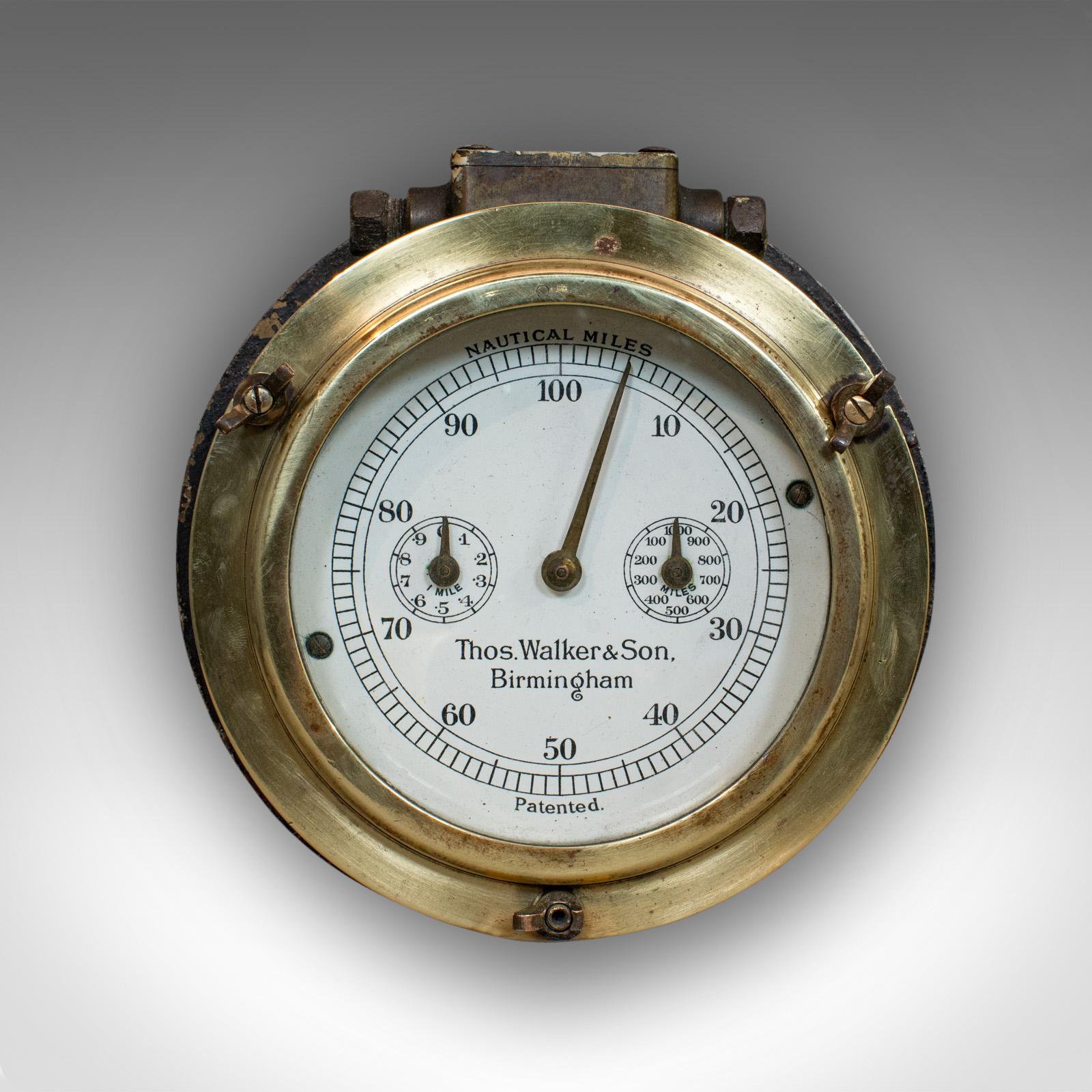 This is an antique ship's log. An English, brass maritime bulkhead mileage log or desk ornament, dating to the early 20th century, circa 1920.

A fine example of walker's patented ship's logs
Displays a desirable aged patina
Polished brass bezel