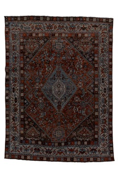 Antiker Shiraz-Teppich mit dunklem Feld und Medaillon in der Mitte