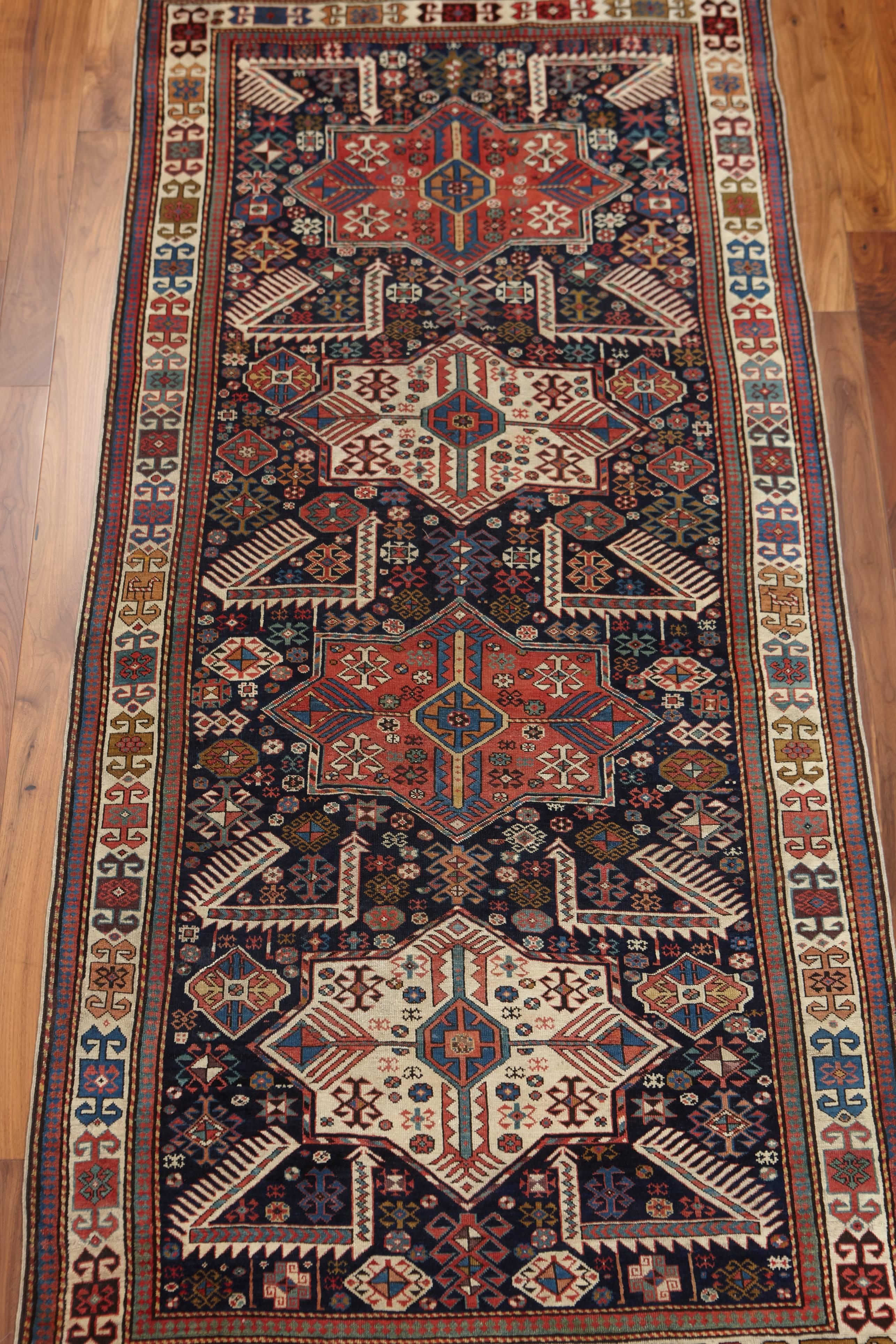 Some of the most recognizable rugs weaved in the Shirvan region and in Shirvan style are Akstafa rugs. Noted for their use of exemplary Akstafa stars and stylized peacocks, these rugs have stood the test of time with their combinations of earthy &
