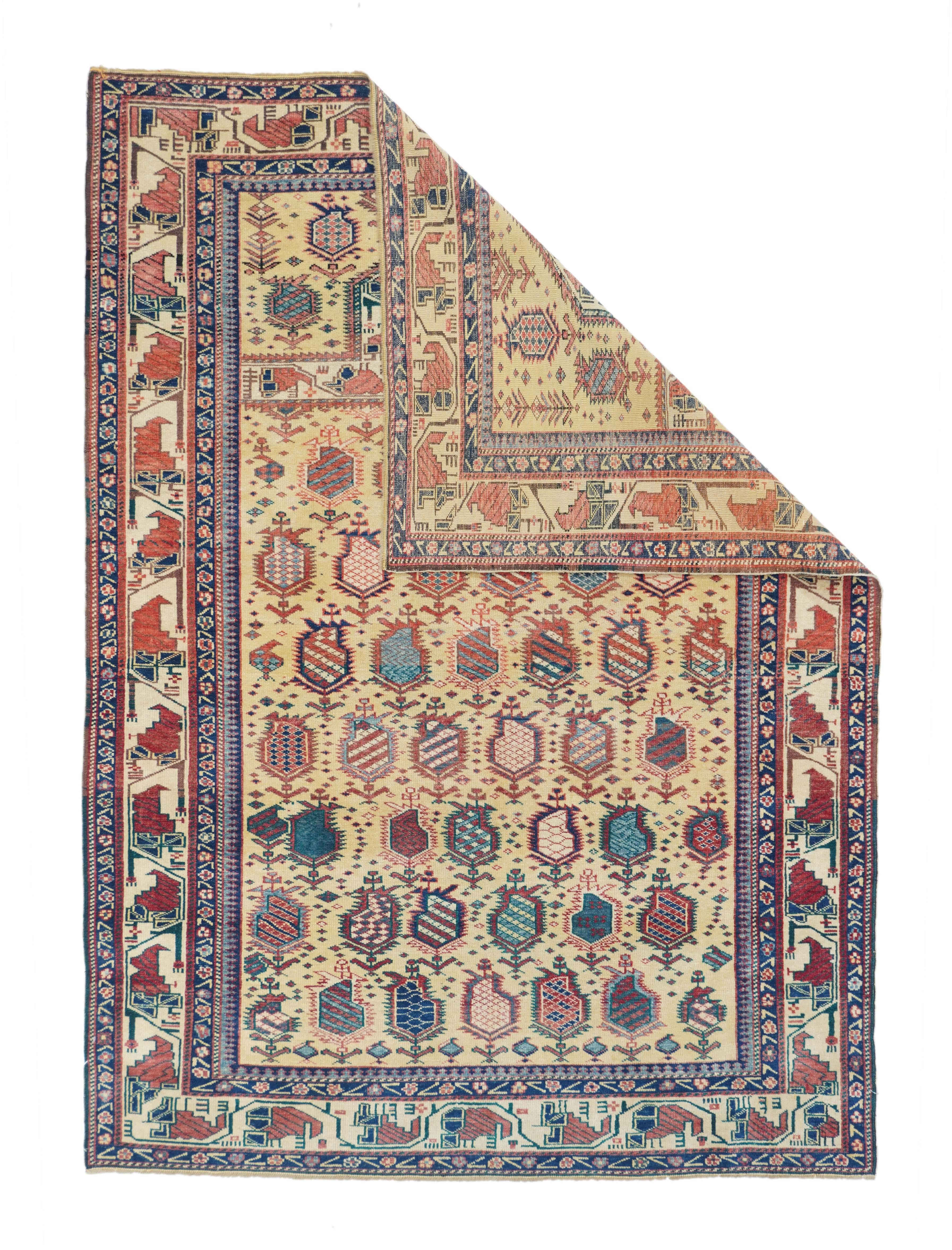Antique Shirvan Caucasian rug measures 4'4'' x 6'1''. This extremely desirable east Caucasian finely woven piece, better for the wall, has a light straw-yellow ground with rows of reversing botehs continuing into the spandrels, under and alongside