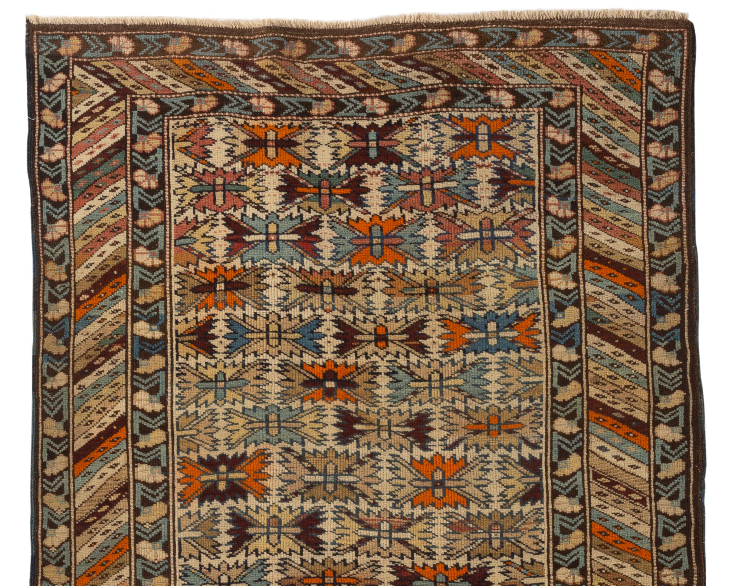 Antique Shirvan Caucasian rug, circa 1900. With an all-over design unusual in Shirvan rugs the floral designs in soft colors which are repeated in the multiple borders. These types of antique Caucasian rugs were woven in the eastern part of the
