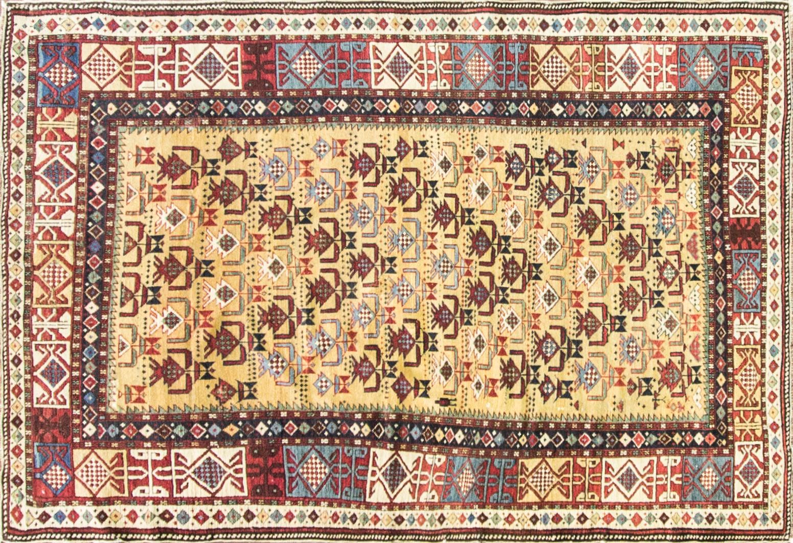 All colors on light gold background Shirvan rug dated, circa 1880s.
The historic Khanate or administrative district of Shirvan produced many highly decorative antique rugs that have a formality and stylistic complexity that is found in few rugs