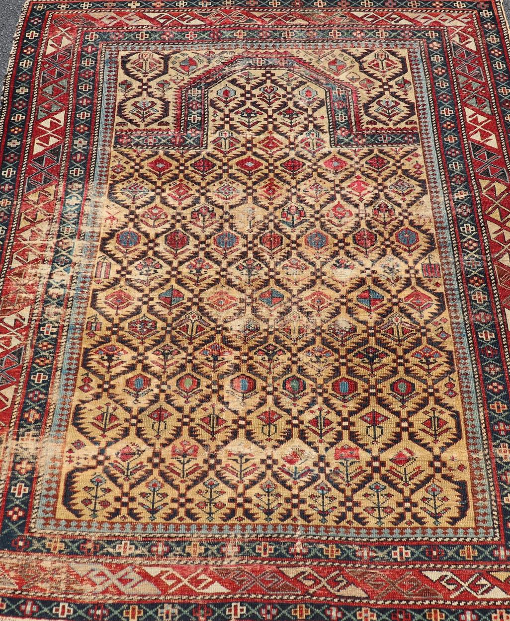 Antique Shirvan Prayer Rug with All-Over Floral Design and Geometric Borders. Keivan Woven Arts / rug X23-0404-251 / early 20th century. 
Measures: 3'9 x 4'8 
This colorful floral-design antique Caucasian Shirvan prayer rug from the late 19th