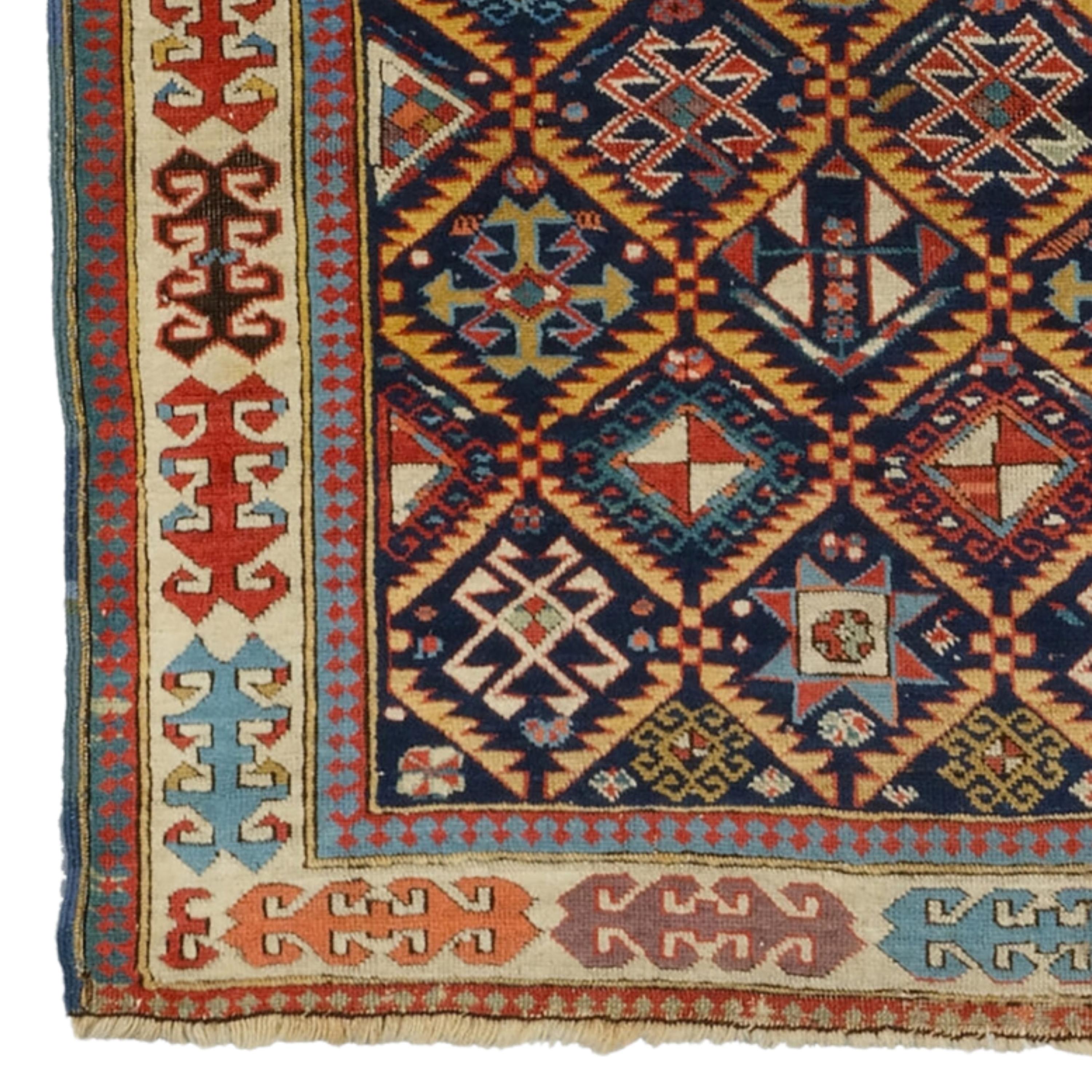 Middle of the 19th Century Akstafa Prayer Rug
Size : 87 x 182 cm

This impressive mid-19th-century Akstafa Carpet is a masterpiece reflecting the elegant and sophisticated craftsmanship of a historic period.

Rich Patterns: The carpet is decorated