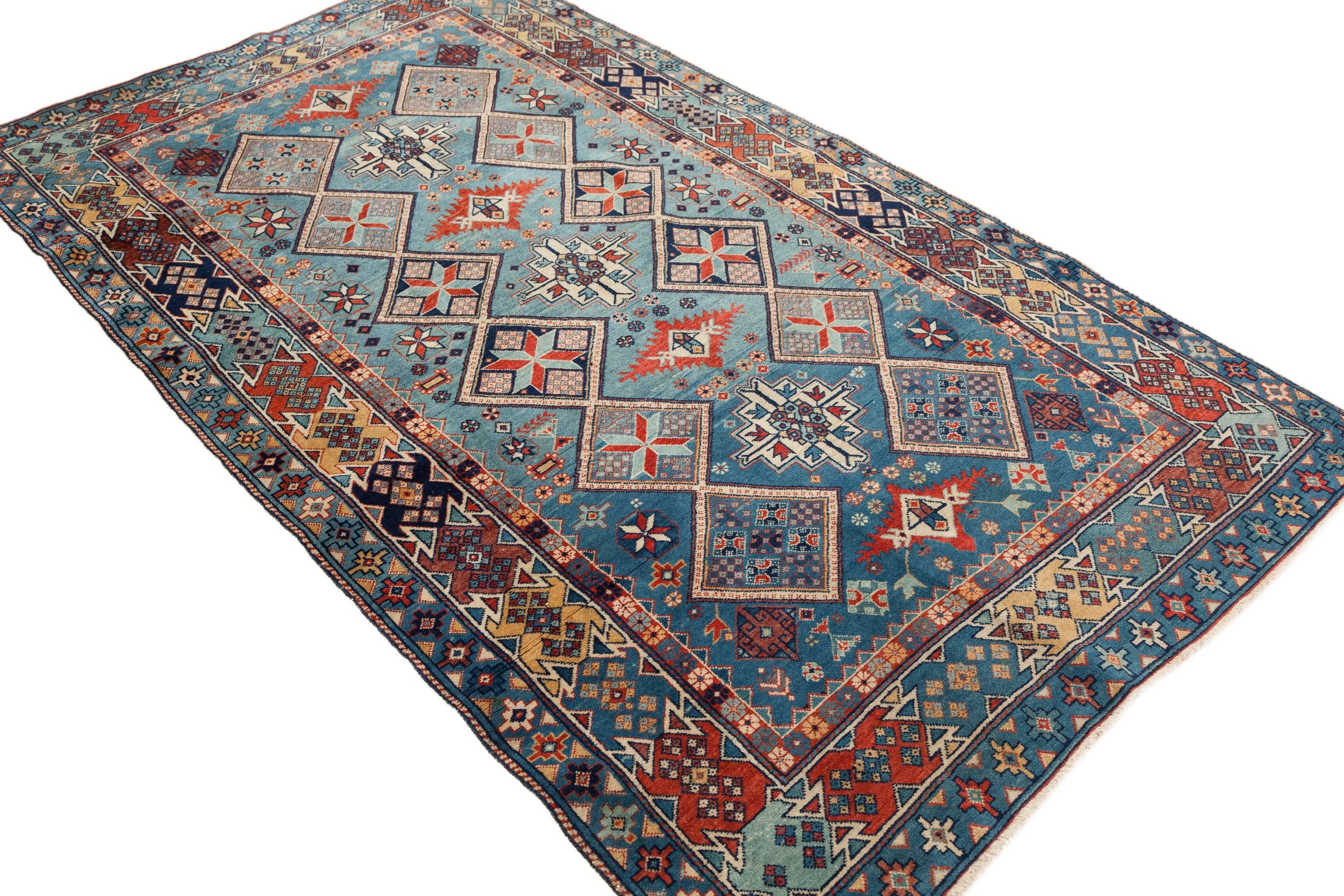 A Shirvan rug from the Caucasus, dating to the first quarter of the 20th century. This piece features a rare pale blue background.