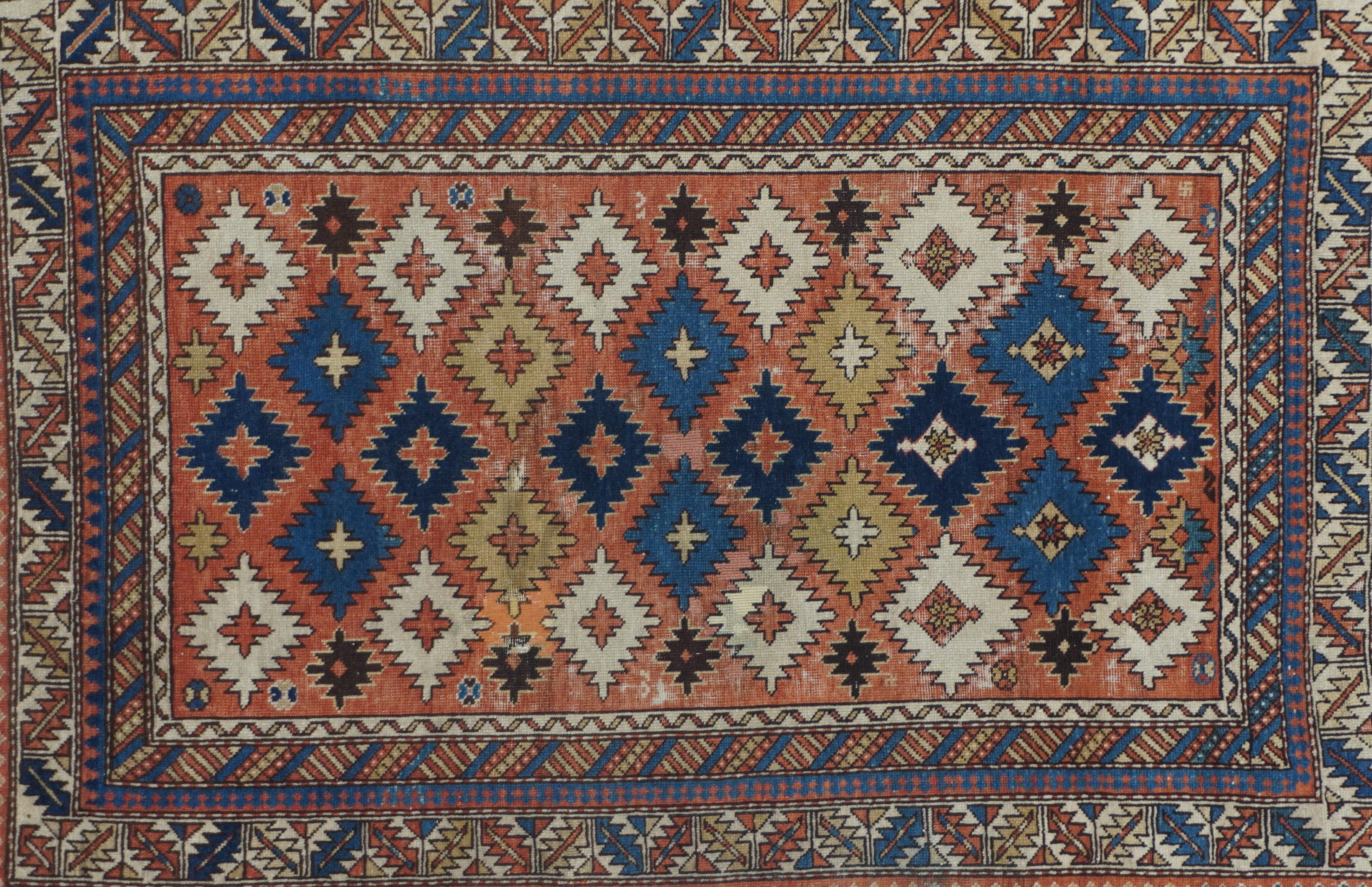 Antique Shirvan  Rug 2'7'' x 3'9''. Eastern Caucasian, west Caspian Caucasian rugs, primarily scatters, in geometric layouts, some prayer, from a wide range of local villages. Marasali prayer rugs are considered as the best. Some pictorials. Wool