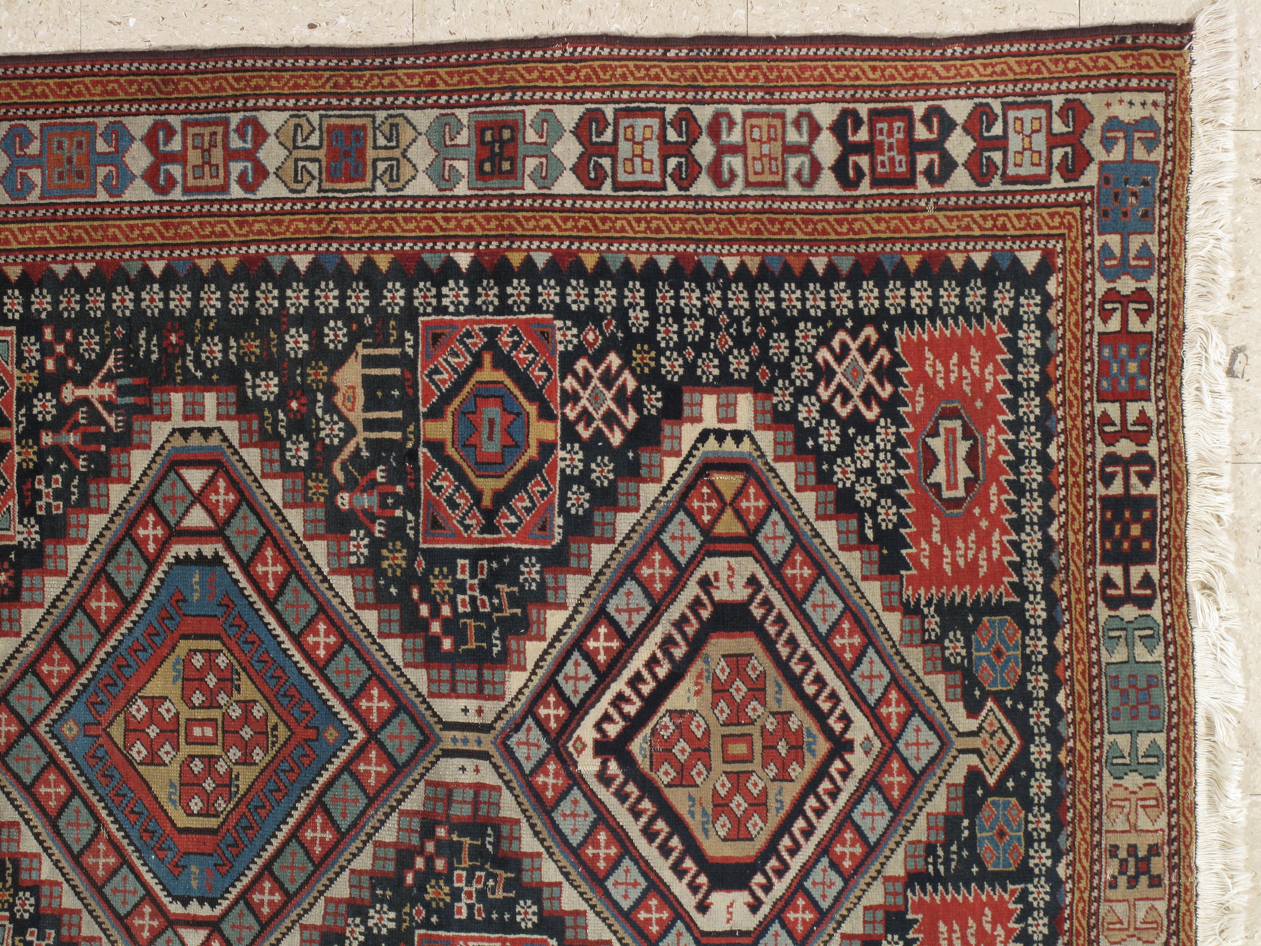 Antique Shirvan rugs of the Caucasus are known to enthusiasts as small pieces with finely detailed all-over repeat designs. Consequently, a Shirvan of this size with an all-over design is quite exceptional and clearly reflects the influence of