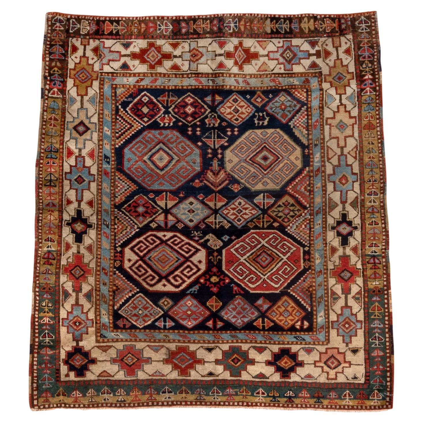 Antique Shirvan Rug in Almost Square with Red Purple and Khaki Tones, Circa 1910