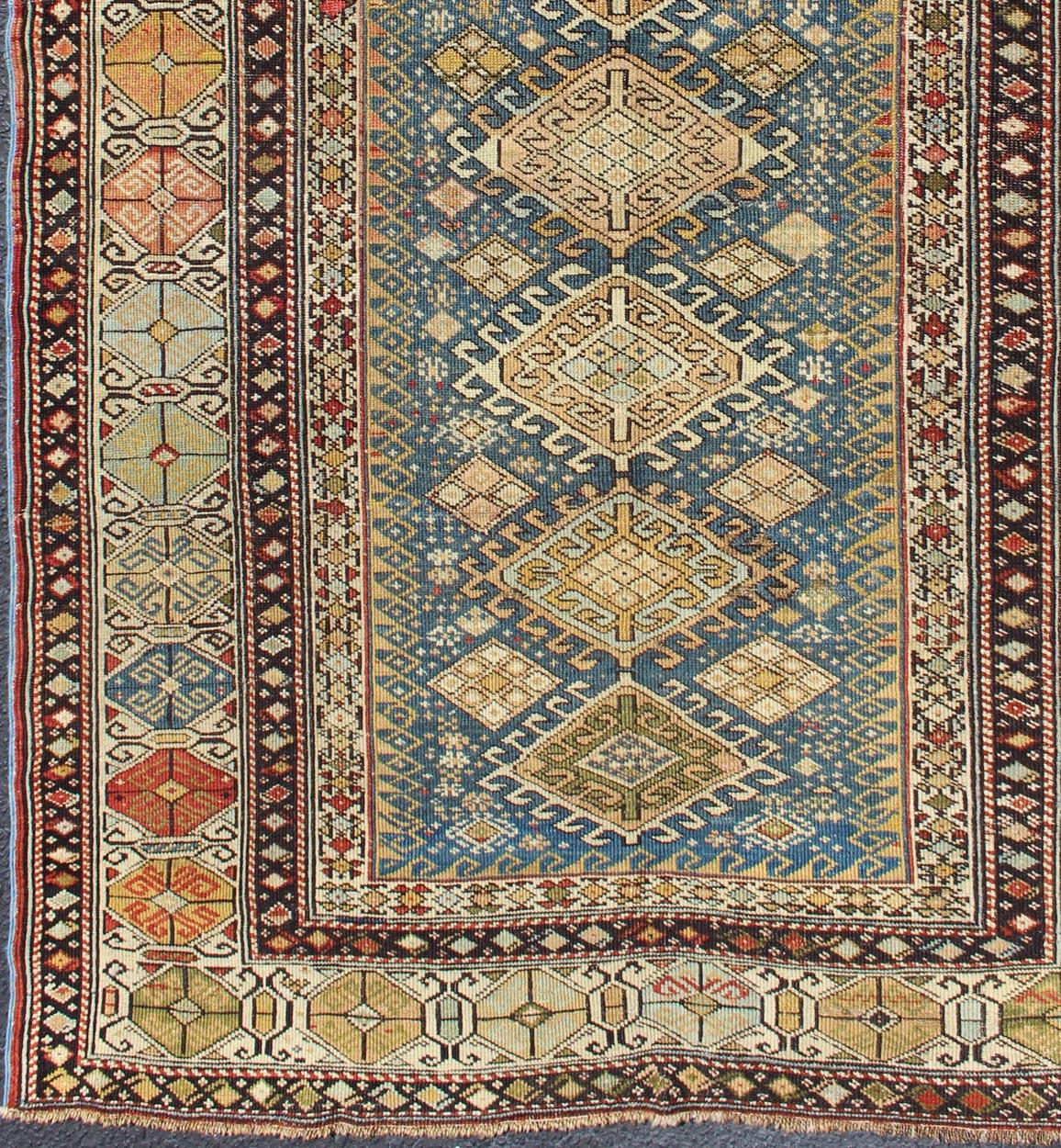 Shirvan Antique Caucasian Rug in Colorful Tones, rug 19-0810, country of origin / type: Caucasus / Shirvan, circa 1880

This colorful medallion carpet from Shirvan features a vibrant color palette and exquisitely intricate designs.

Measures: 3'8 x