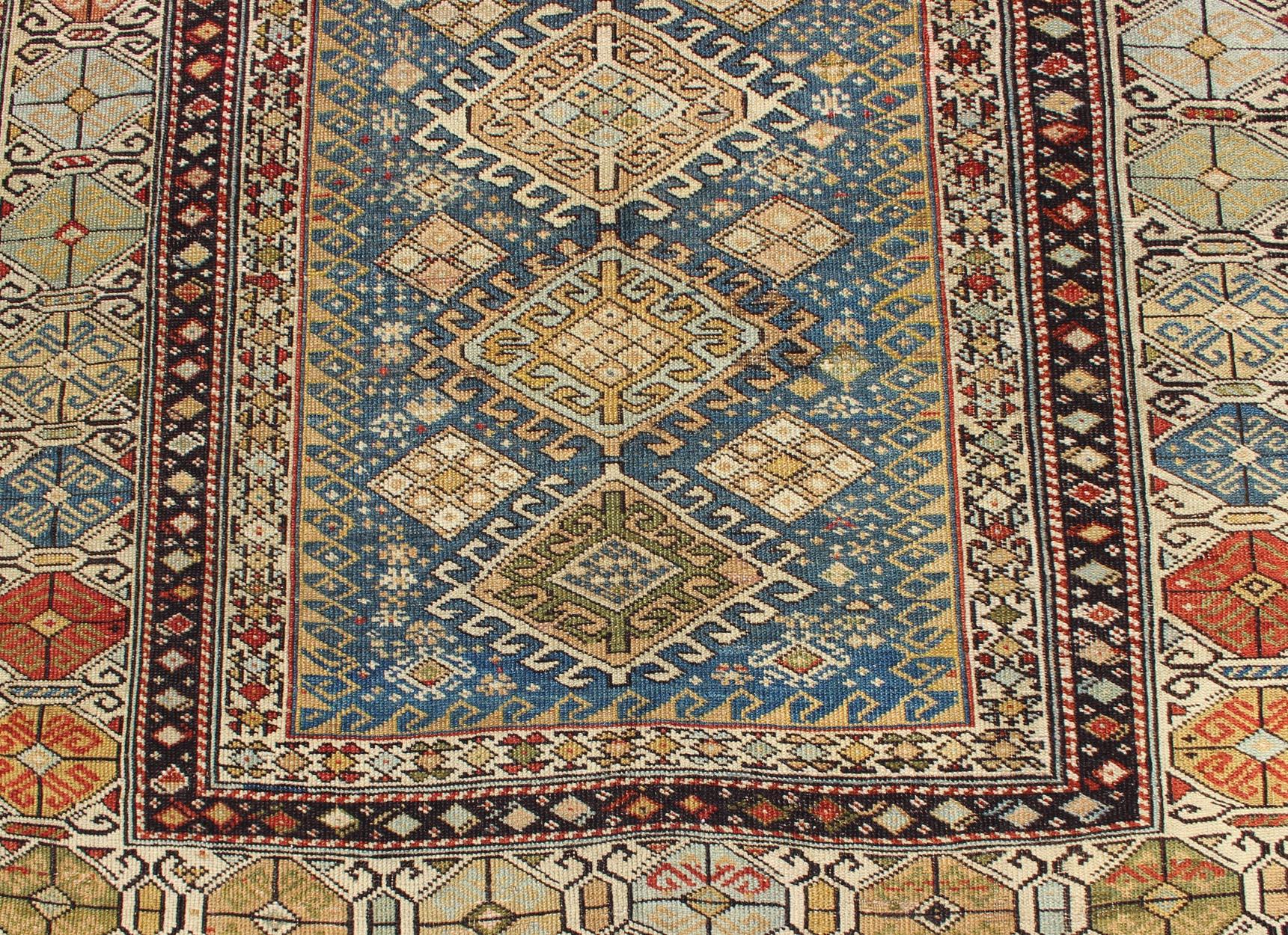 Tribal Antique Shirvan Rug in Teal Blue Background with Exquisitely Intricate Design For Sale