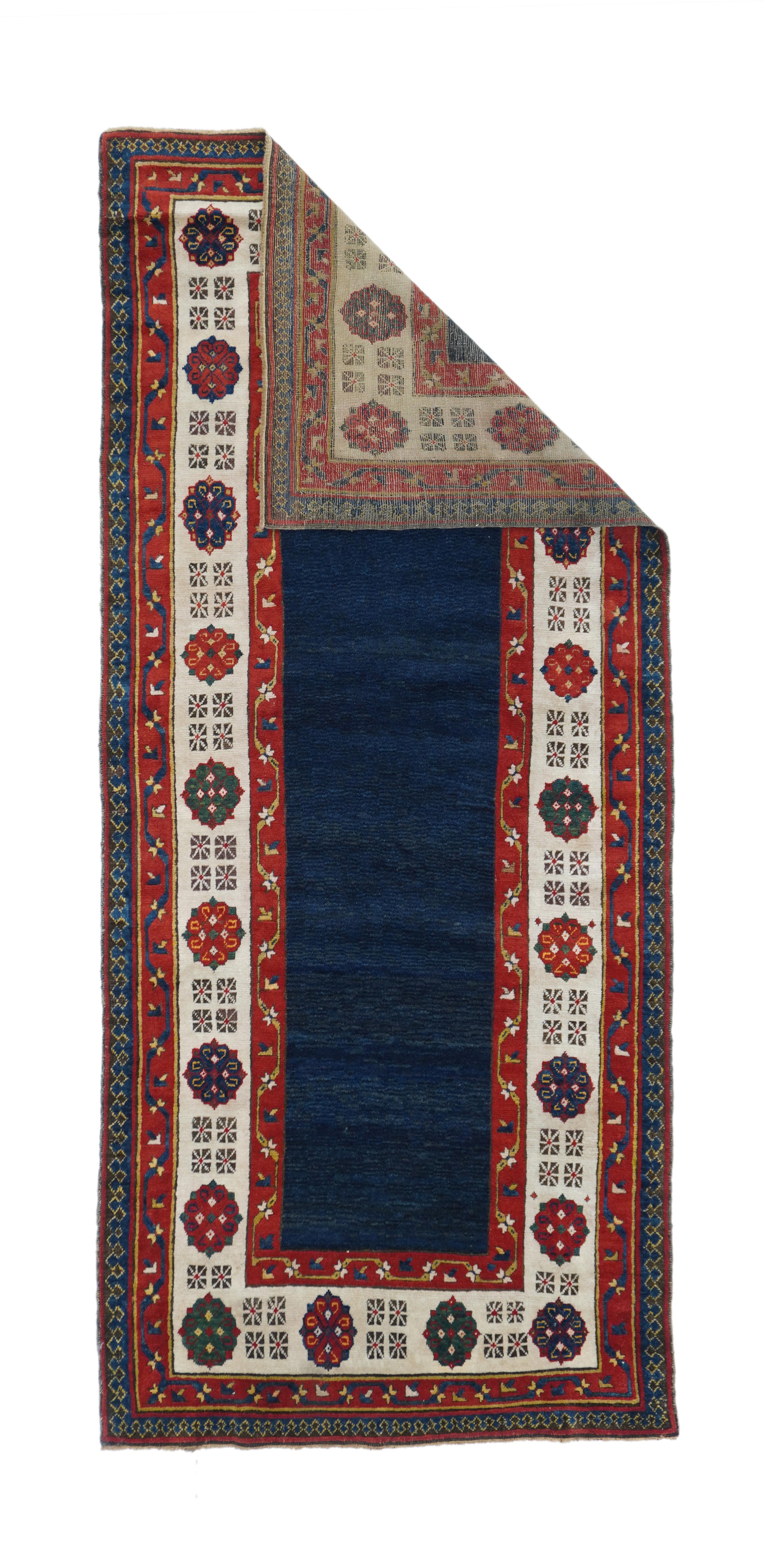 Antique Shirvan Talish rug 3'6'' x 8'. Classic SE Caucasian Talish with the desirable dark blue, totally open field and the ivory rosette and 