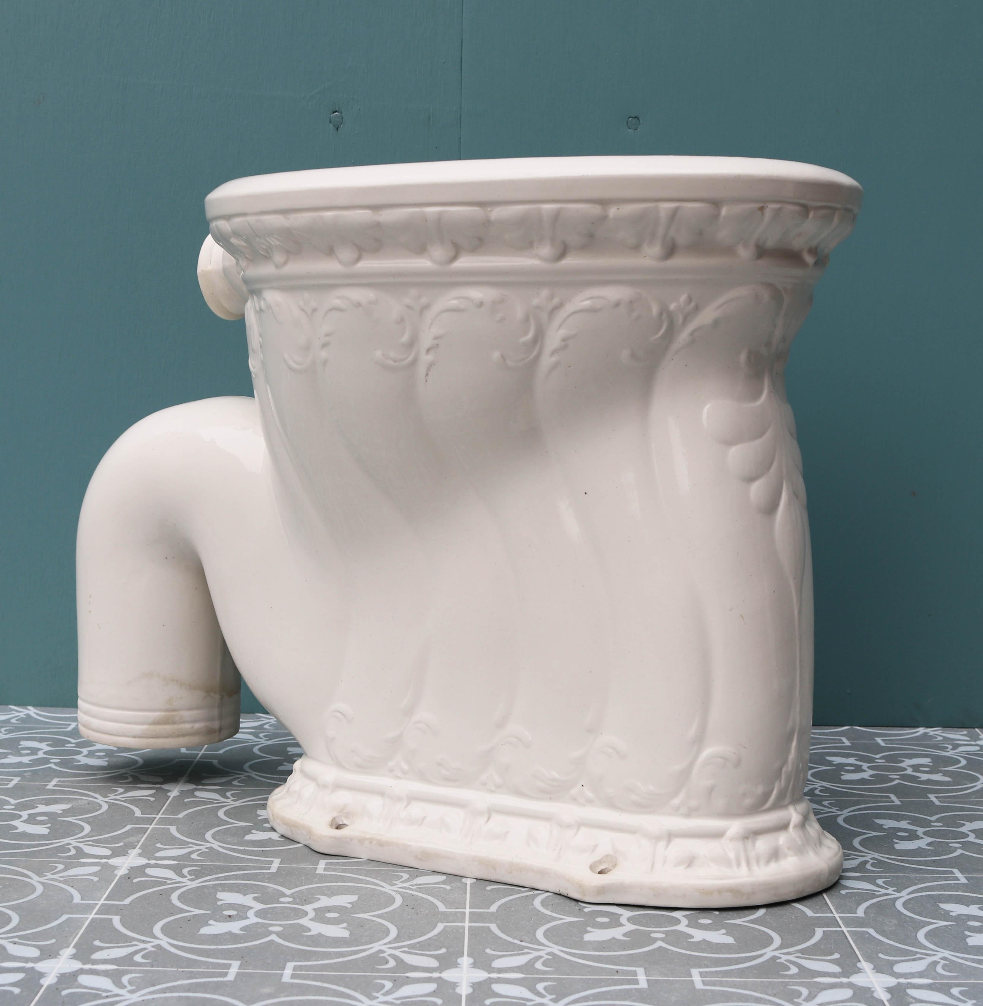 A Victorian period ‘Shower’ toilet pan. White glaze with an embossed pattern. ‘S’ trap.